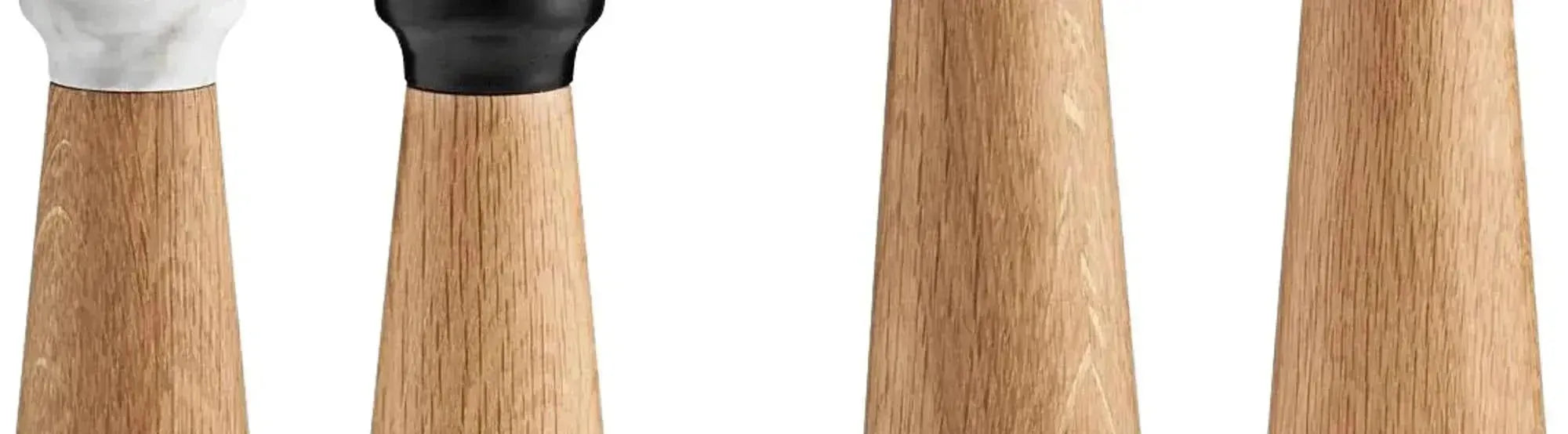 Entdecken Sie die Craft Serie von Normann Copenhagen: stilvolle Salz- und Pfefferstreuer aus Marmor und Eichenholz, die Funktionalität und skandinavischen Minimalismus vereinen.
