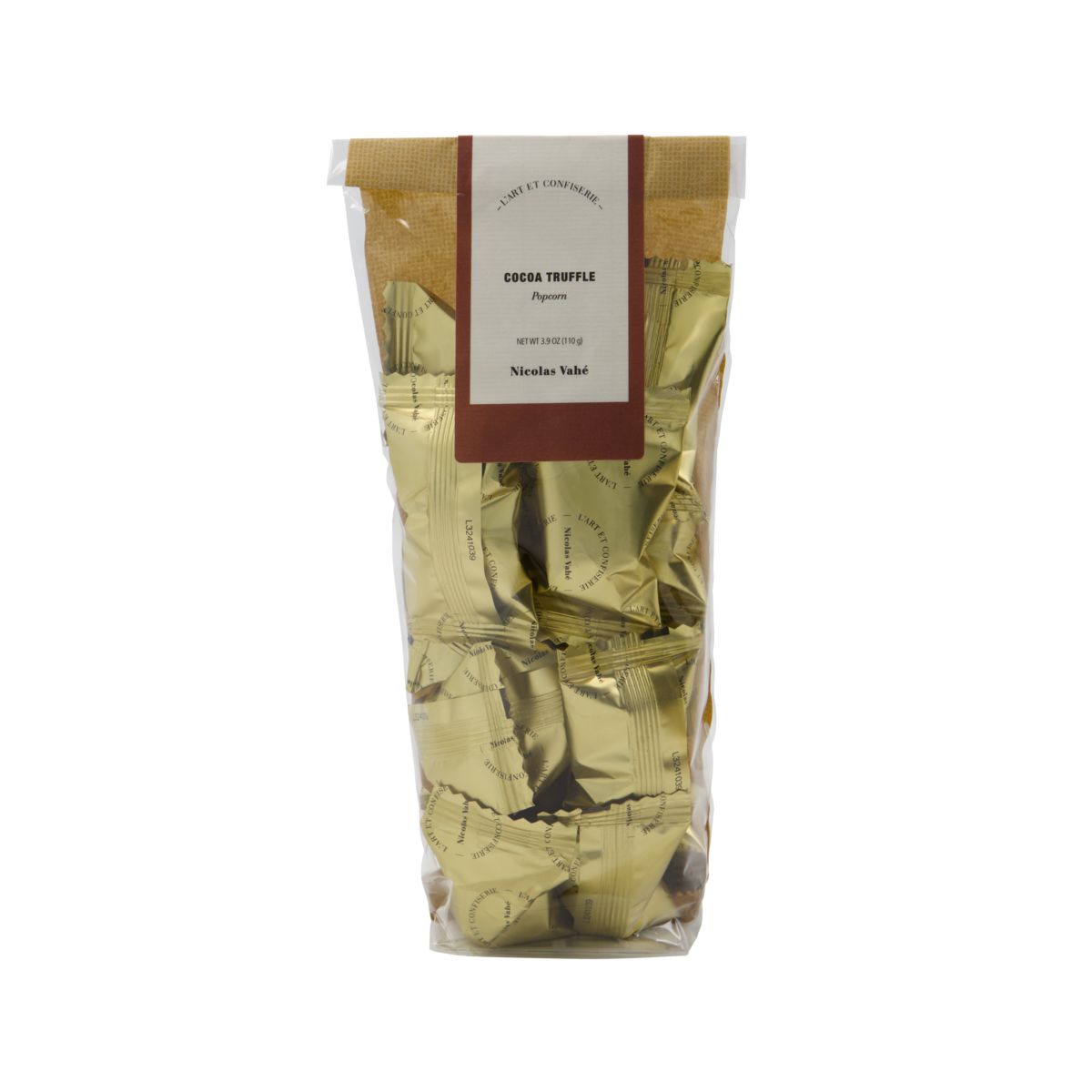 Verwöhnen Sie Ihre Sinne mit Nicolas Vahés Schokotrüffeln: zartschmelzende Schokolade trifft auf knuspriges Popcorn. Ein himmlischer Genuss!