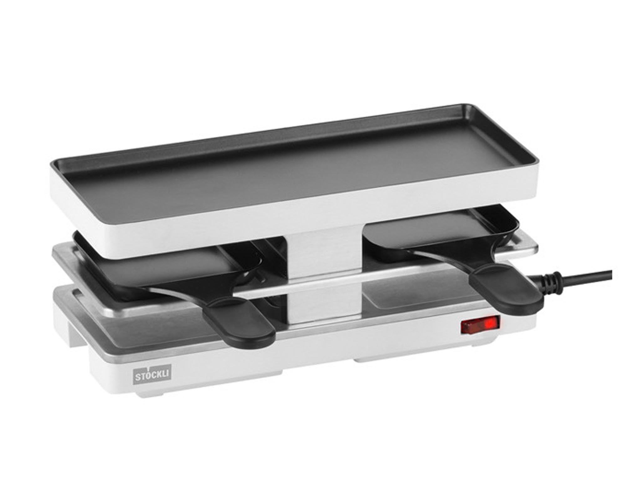 Entdecken Sie den STÖCKLI Raclettegrill Twinboard: Großzügige Grillplatten, individuell regulierbare Heizelemente und geselliges Kochen für unvergessliche Raclette-Abende!