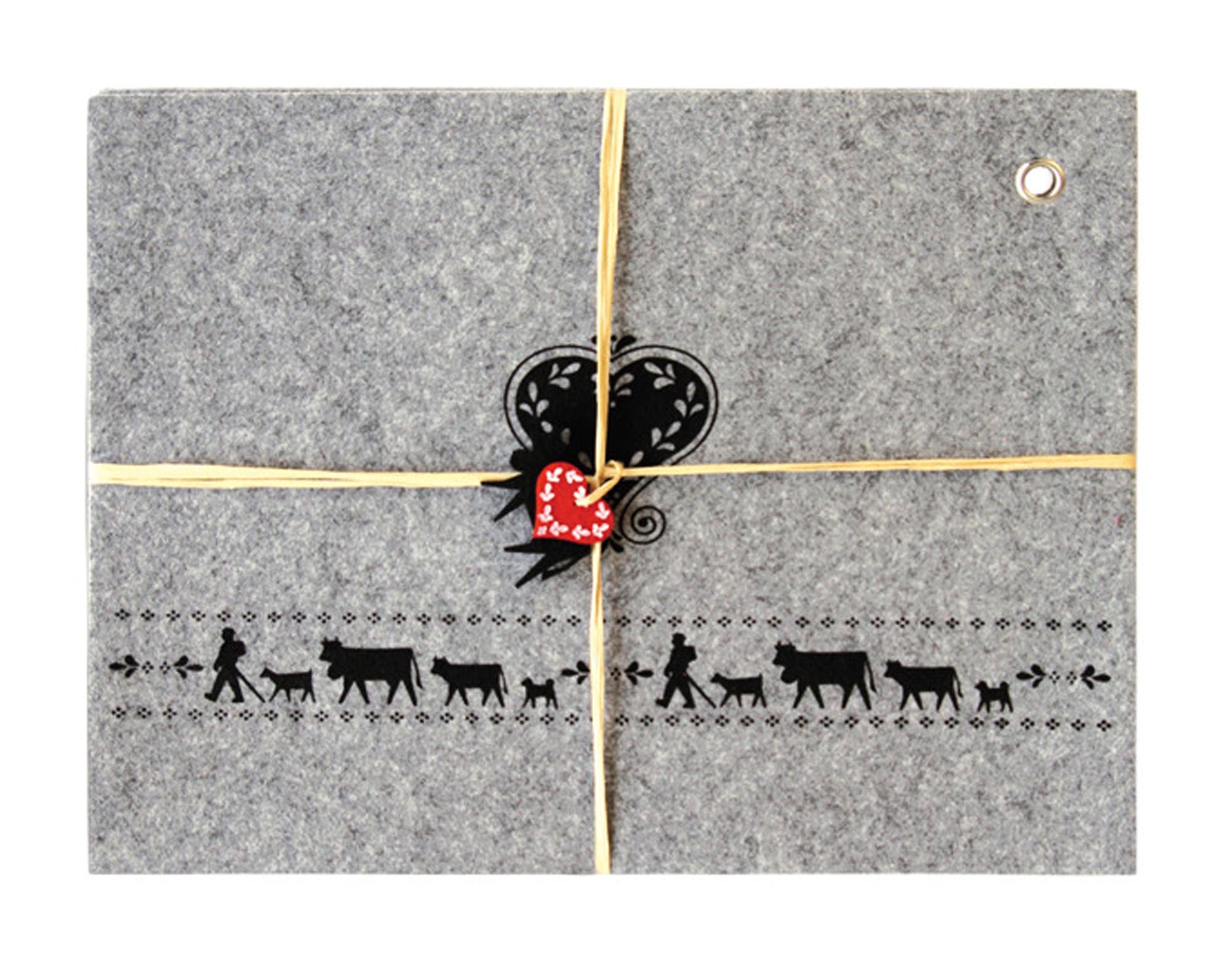 Entdecken Sie das STEINLIN Tischset Alpaufzug aus grauem Filz (4 Stück, 42x32 cm) – stilvoll, pflegeleicht und ideal für jeden Anlass.