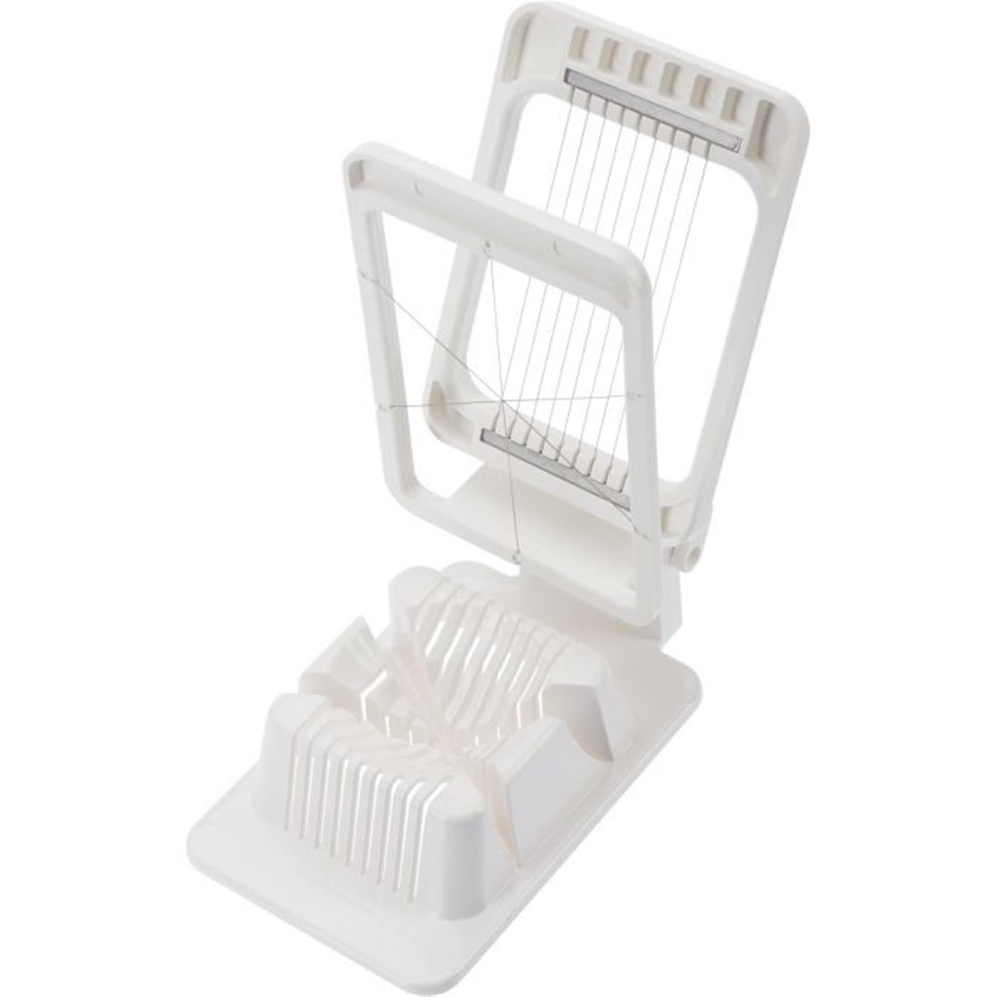 Praktischer Kombi-Eierteiler von Westmark, ideal zum Schneiden und Teilen von Eiern, kompakt mit 13.5x8.5x4cm Massen.