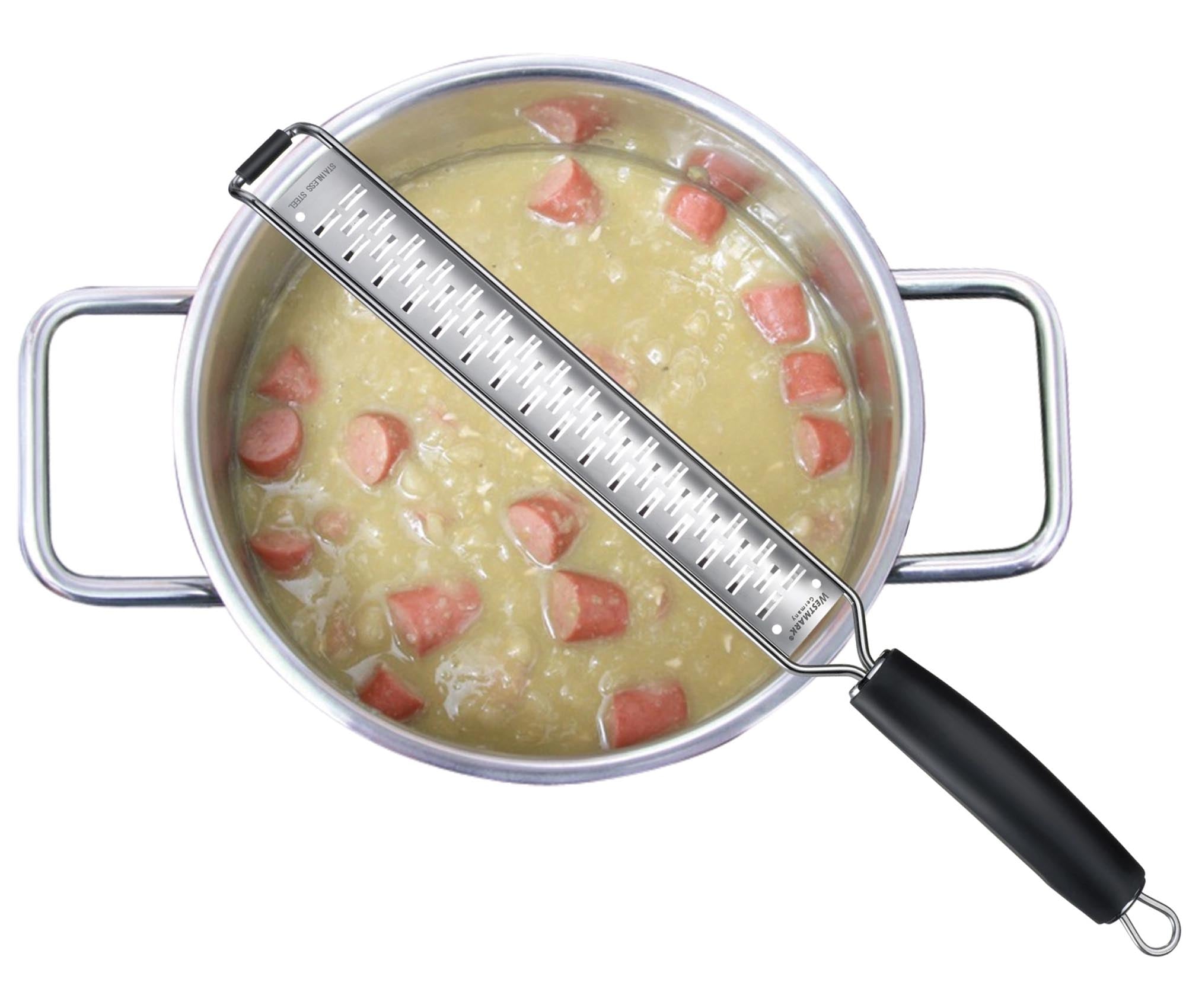 Die Technicus-Pro Reibe von Westmark (40x3.5x3cm) ist robust, präzise und ideal für vielseitige Küchenanwendungen.