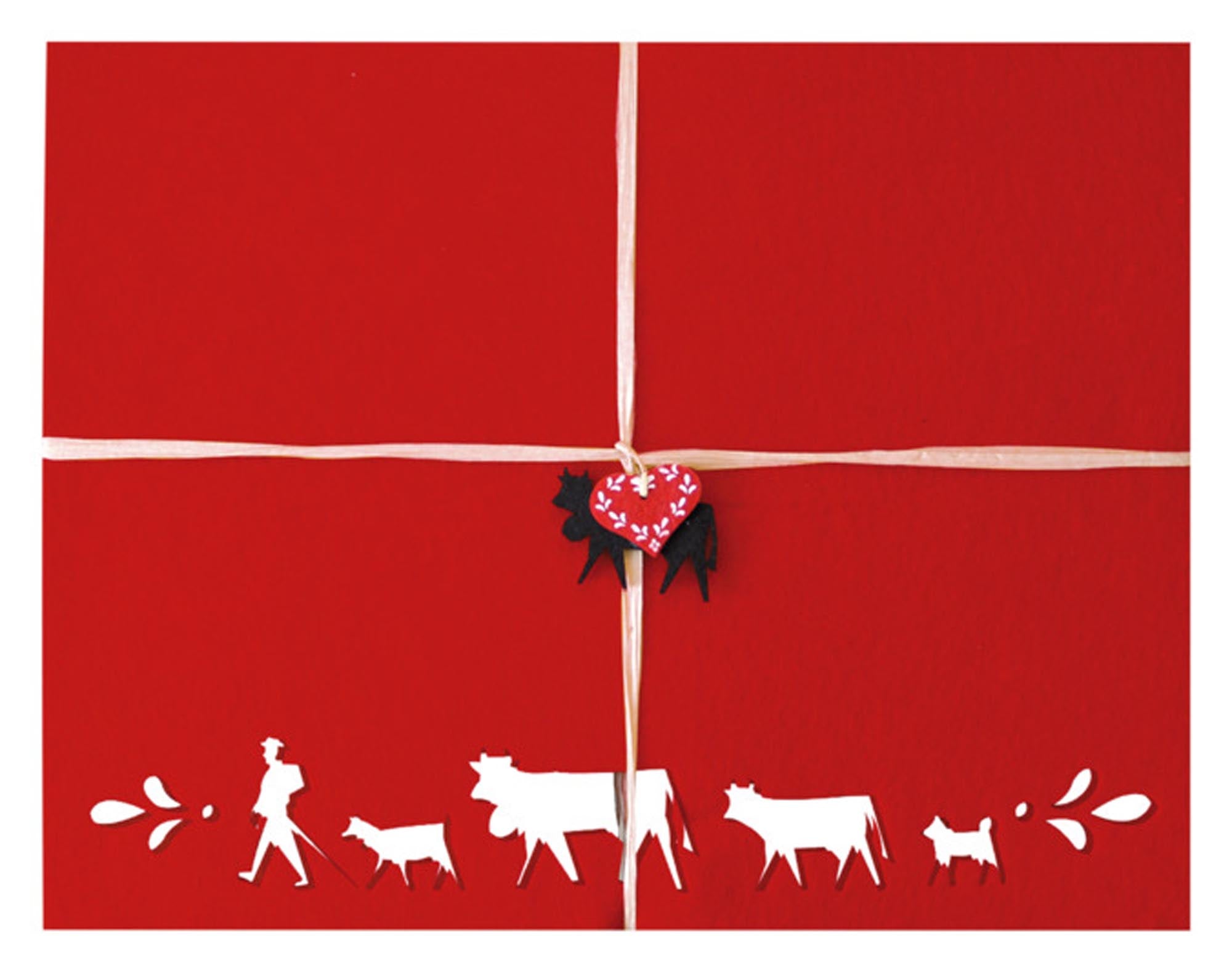 Entdecken Sie das stilvolle STEINLIN Tischset Alpaufzug aus hochwertigem Filz. Praktisches Set mit 4 Stück, 42x32 cm, schmutzabweisend und pflegeleicht.