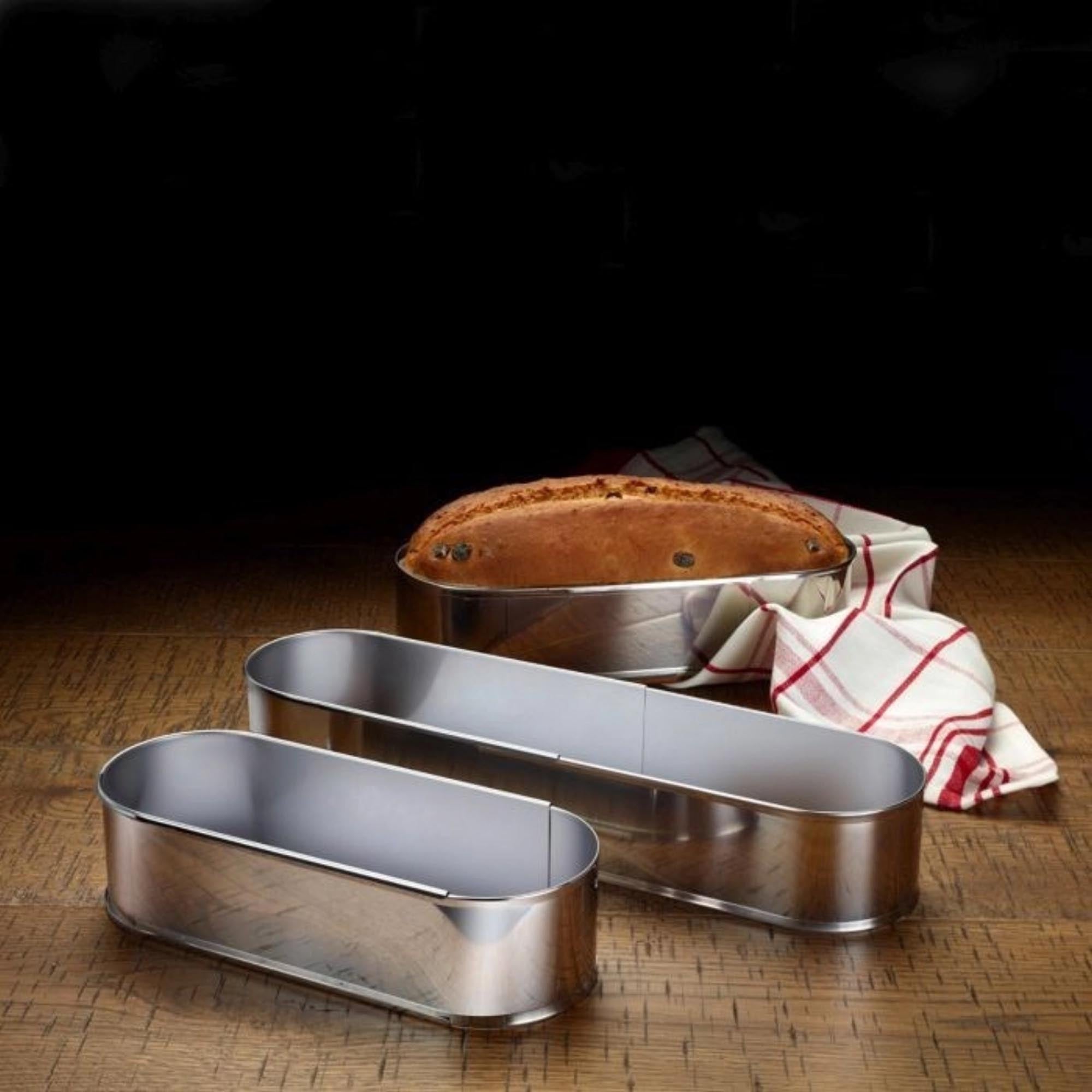 Praktische ovale Backform von Westmark, ausziehbar von 27-40 cm, ideal für Kuchen und Aufläufe, Masse: 27x9.5x7 cm.