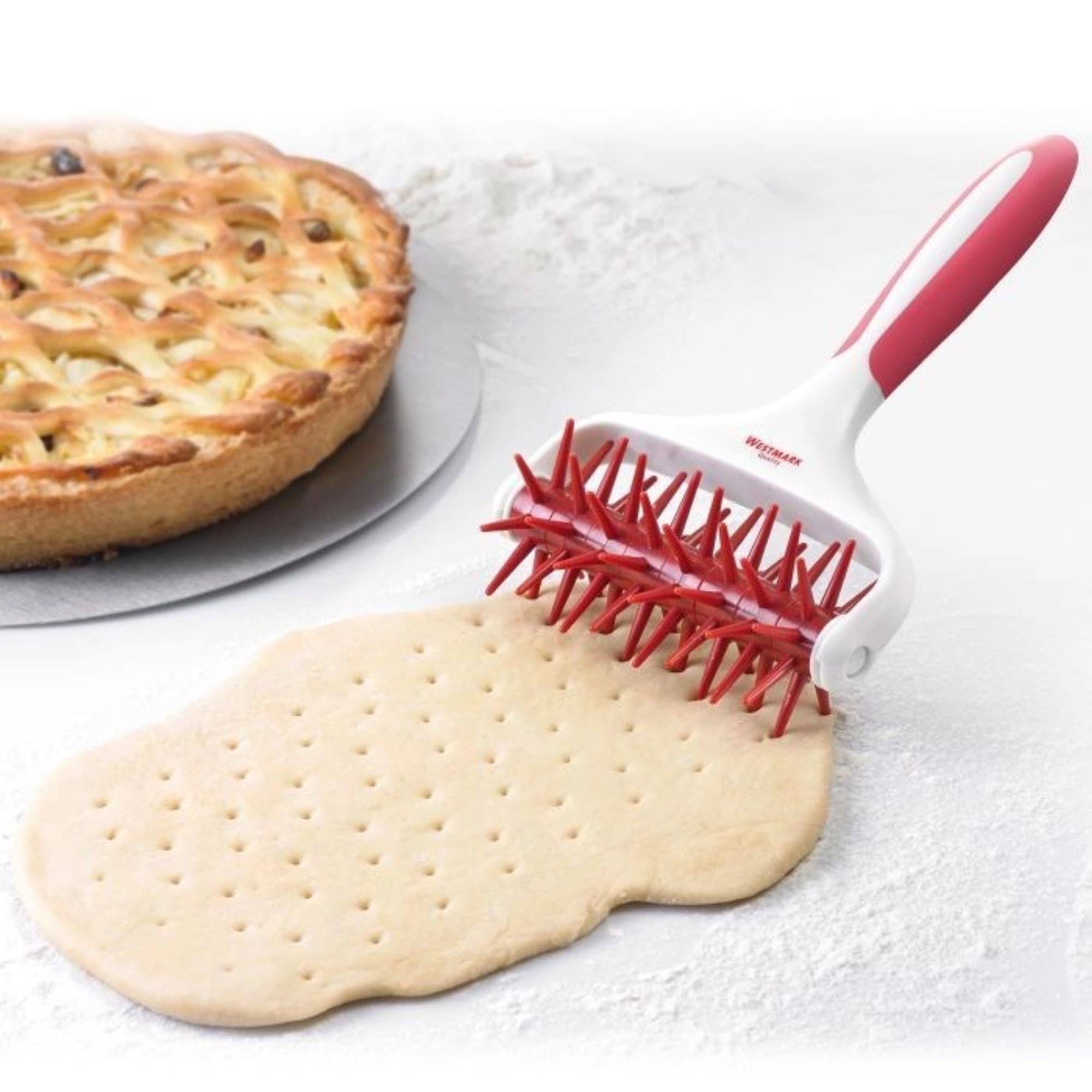 Stipproller von Westmark mit 7 Rädchen, ideal für Teigbearbeitung, Masse: 20x12.5x5.5 cm, robust und benutzerfreundlich.