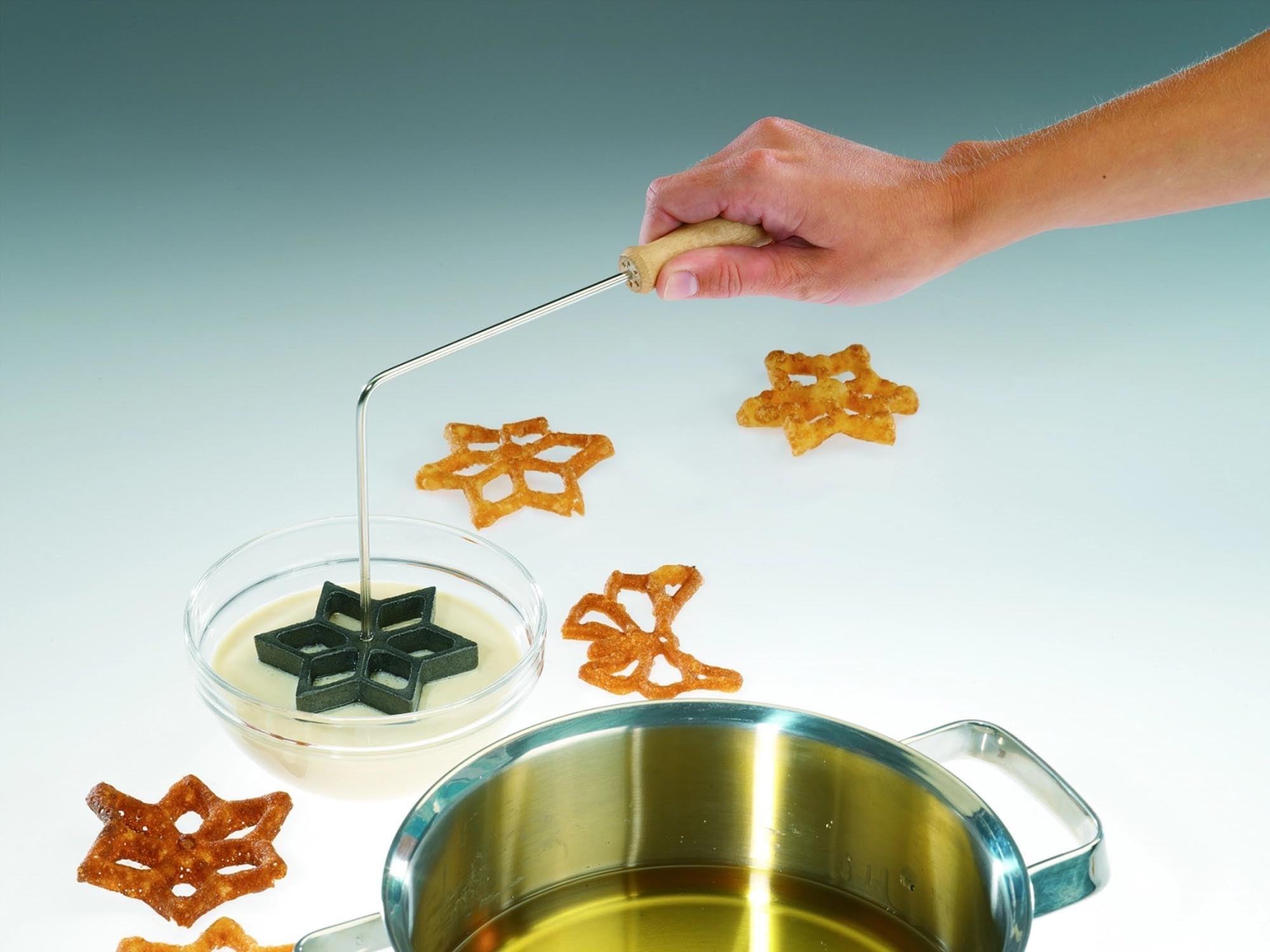 Westmark Waffelbäckerei: Backform mit 3 originellen Motiven, 26x13.5x9cm, perfekt für individuelle und kreative Waffelideen.