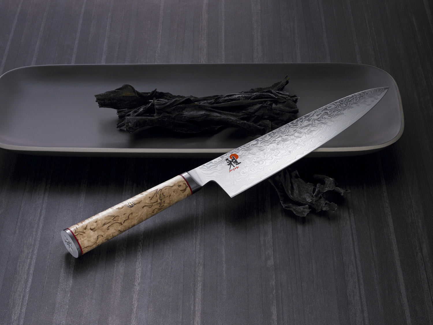 MIYABI 5000MCD Gyutoh, 240mm Damastmesser mit elegantem Design, scharfer Klinge und ergonomischem Griff, perfekt für präzises Schneiden.