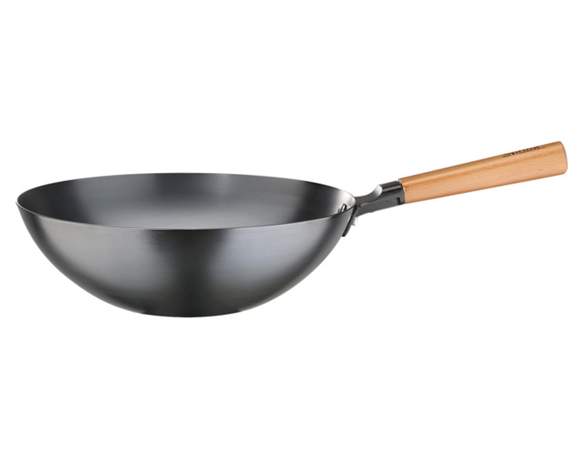 Der Wok Canton ø 30 cm von SPRING: Hochwertig, antihaftbeschichtet, ideal für asiatische Gerichte. Perfekt für alle Herdarten.