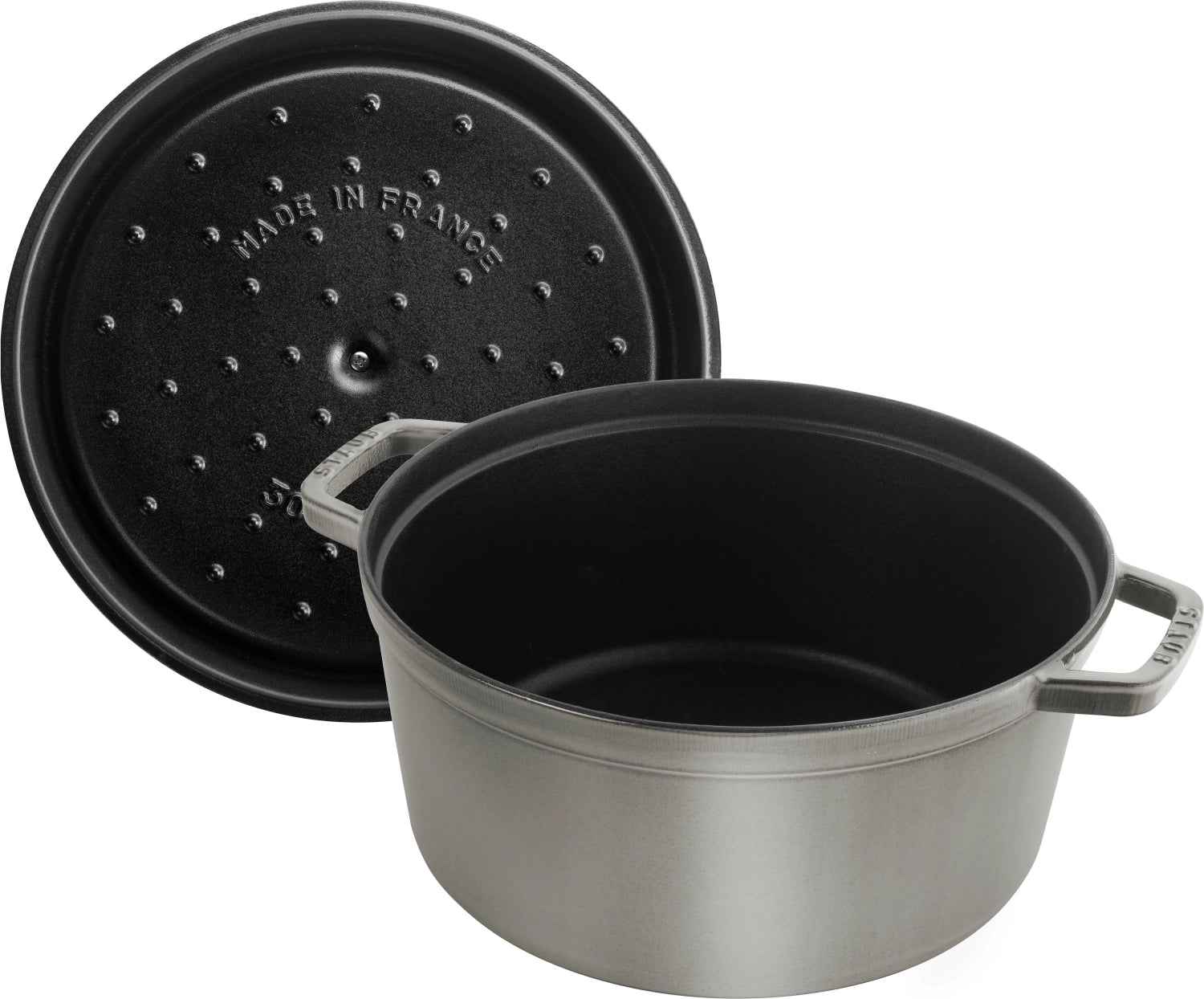 Elegante runde Cocotte von Staub mit 8,35 l, perfekt für schmackhafte Eintöpfe und Braten, die stilvoll auf den Tisch kommen.