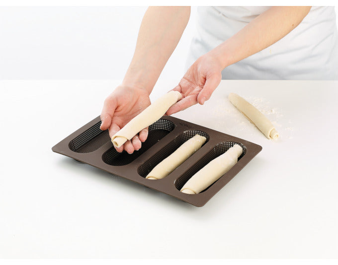 Entdecken Sie die LEKUE Baguette Backform Mini 4er aus Silikon (29x20 cm) für perfekte, hausgemachte Mini-Baguettes. Ideal für Snacks und kreative Sandwiches!