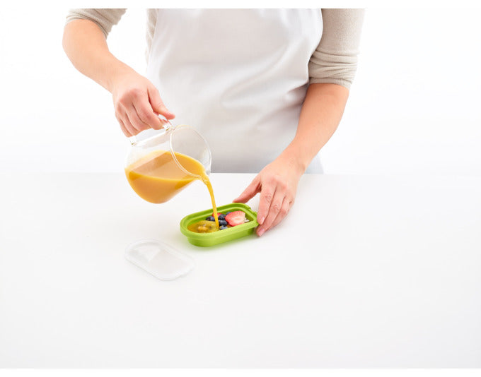 Entdecken Sie die LÉKUÉ Glaceform Magnum: 4 Silikonformen für kreatives, gesundes Eis am Stiel. Perfekt für heiße Sommertage!