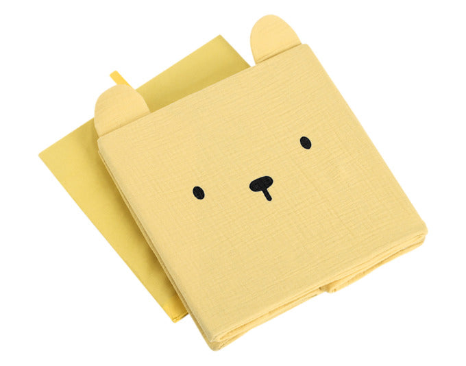 Entdecken Sie die charmante ZELLER Aufbewahrungsbox Bär aus gelbem Musselin. Ideal für das Kinderzimmer, praktisch und faltbar, 28x28x28 cm.