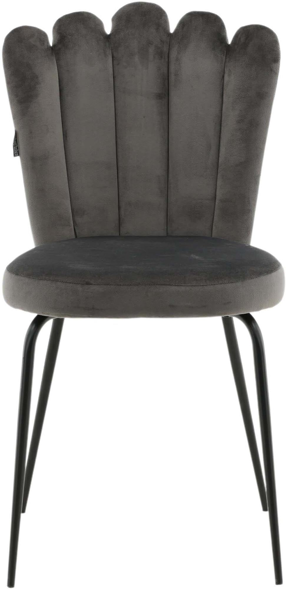 Entdecken Sie den Limhamn Stuhl: Eleganter Samt und robustes Metall vereinen sich für höchsten Komfort und Stil in Ihrem Esszimmer.