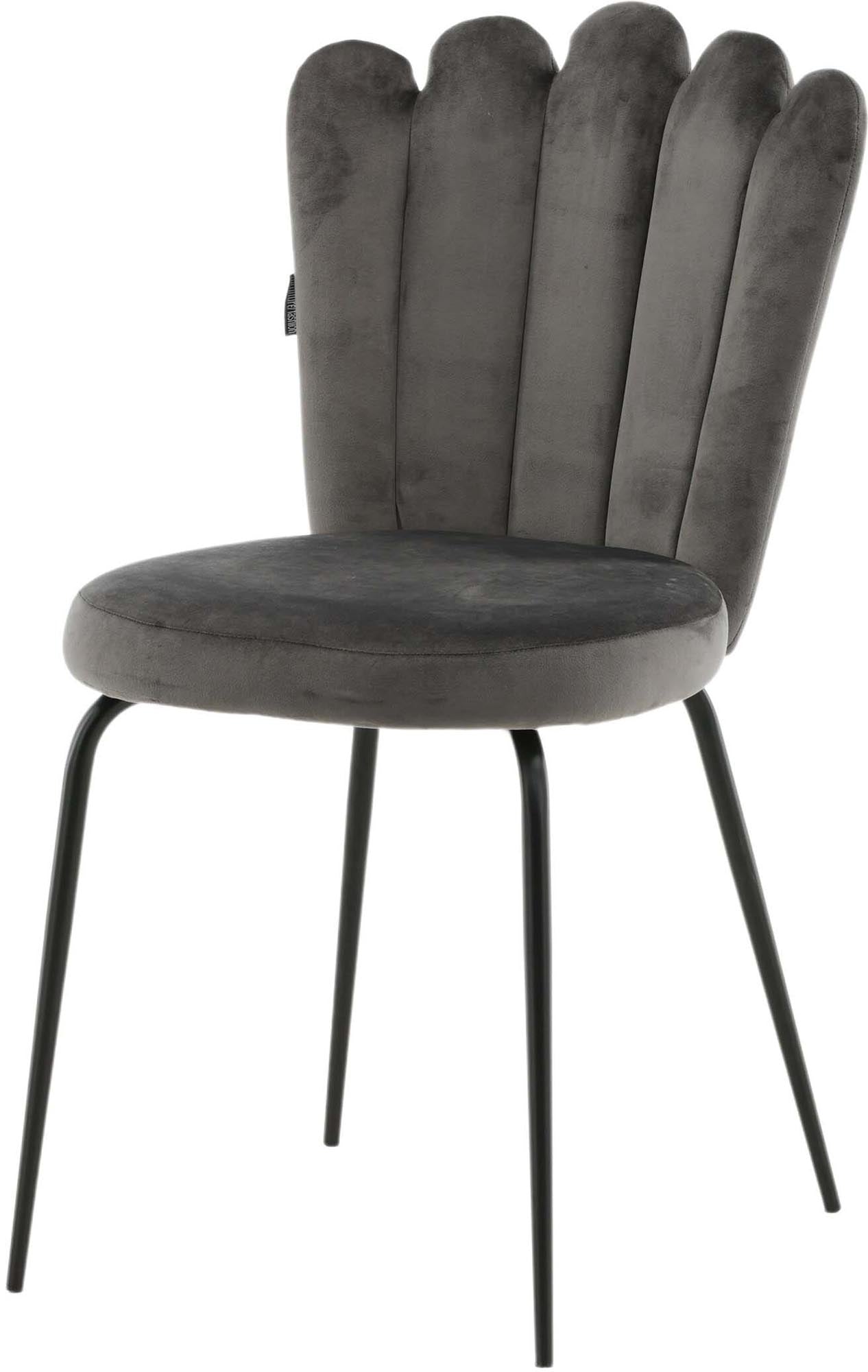 Erleben Sie den Limhamn Stuhl von Furniture Fashion: Luxuriöser Samt und stabiles Metall schaffen eine stilvolle Atmosphäre für jedes Esszimmer.