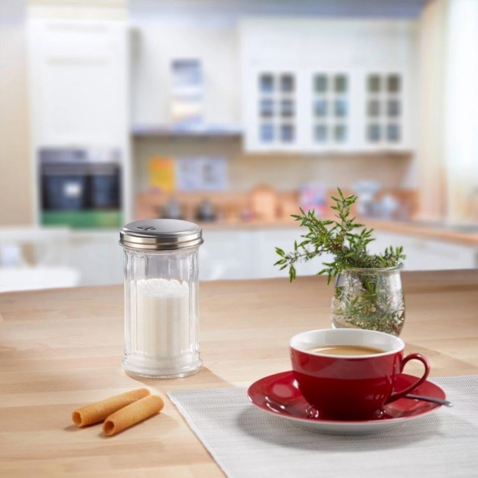 Eleganter Zuckerstreuer aus Glas und Edelstahl, 300ml, ideal für präzises Dosieren und stilvolles Servieren von Zucker.