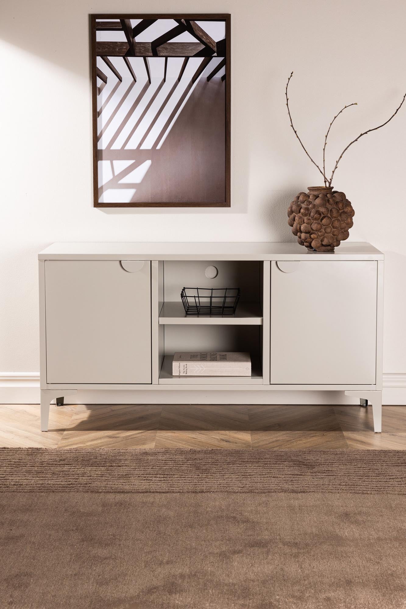 Moderner Piring TV-Ständer aus hochwertigem Stahl, vereint Stil und Funktionalität mit großzügigem Stauraum für Ihre Medien und Deko.