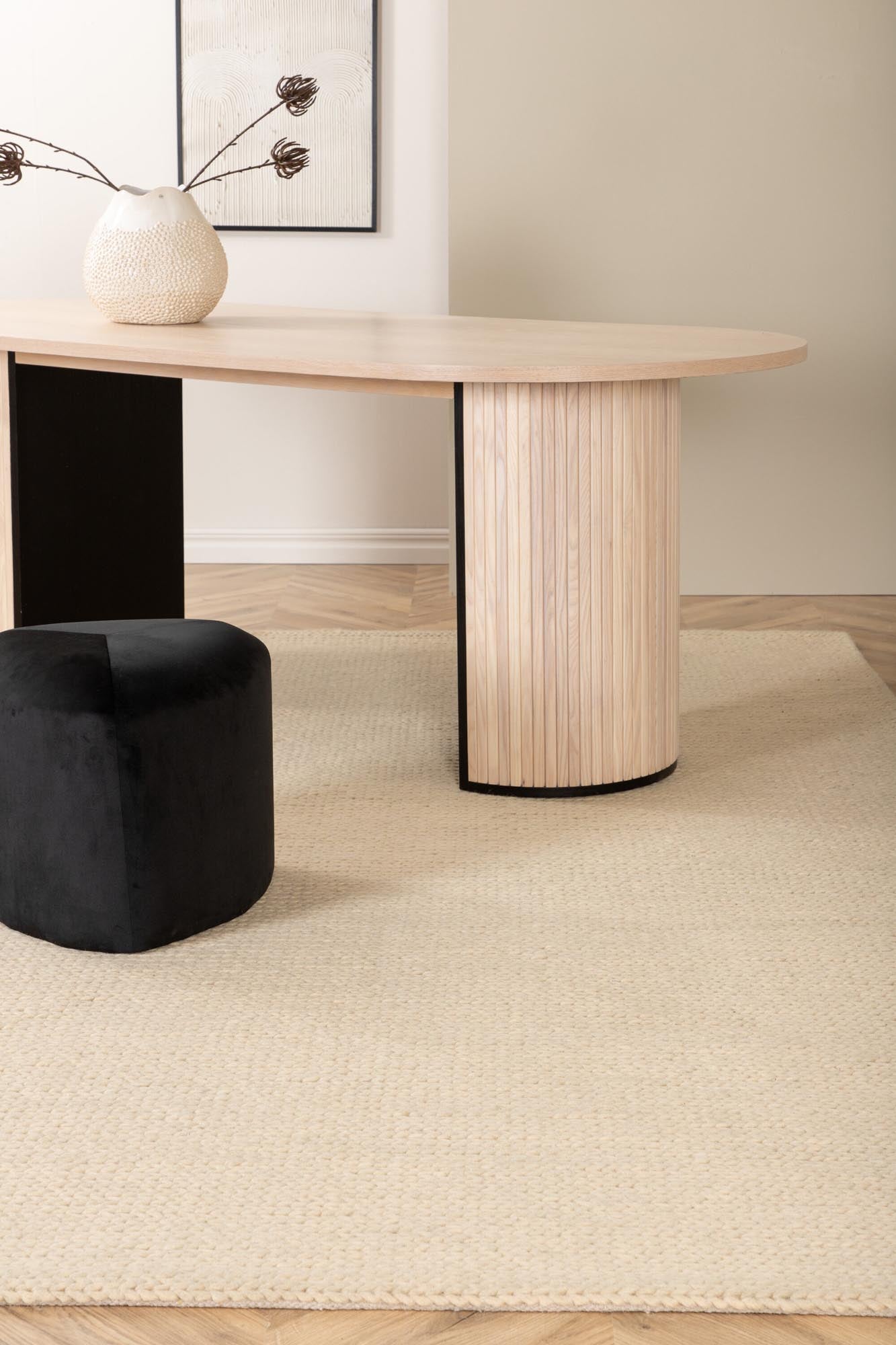 Entdecken Sie die elegante Marta Wollmatte von Venture Home – ein handgewebter Teppich in knochenweiß, der Komfort und Stil vereint. Ideal für Ihr Zuhause!