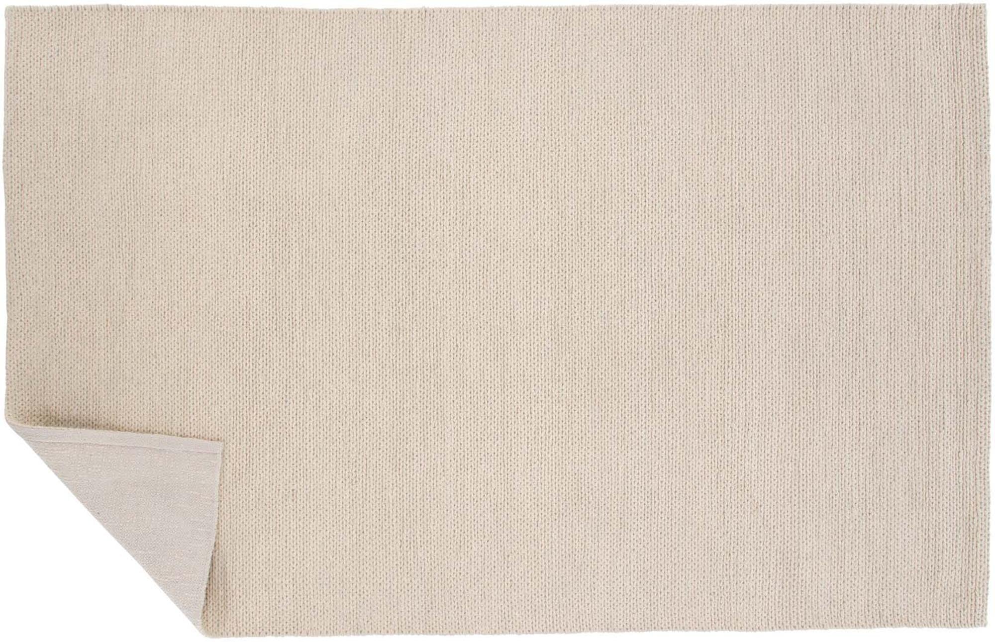 Erleben Sie die luxuriöse Marta Wollmatte von Venture Home – ein handgewebter Teppich in elegantem Knochenweiß, der Gemütlichkeit und Stil in Ihr Zuhause bringt.