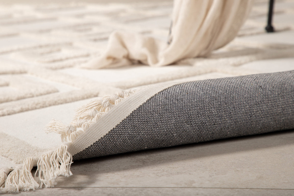 Towa Teppich in Weiss präsentiert im Onlineshop von KAQTU Design AG. Teppich ist von Venture Home