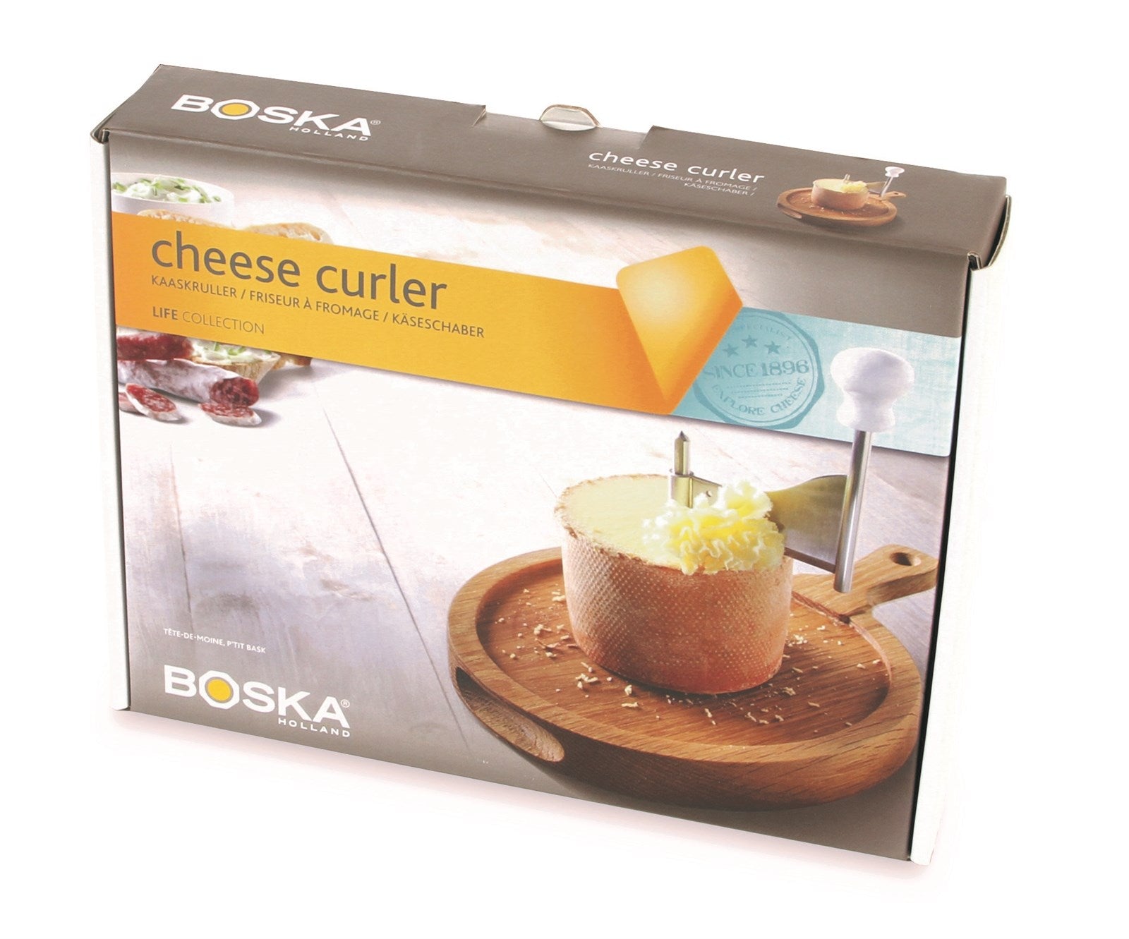 Käseschaber Friends von Boska: Robuster Edelstahl und eleganter Eiche-Griff für müheloses Käse schneiden und stilvolles Servieren. Ideal für Käseliebhaber!