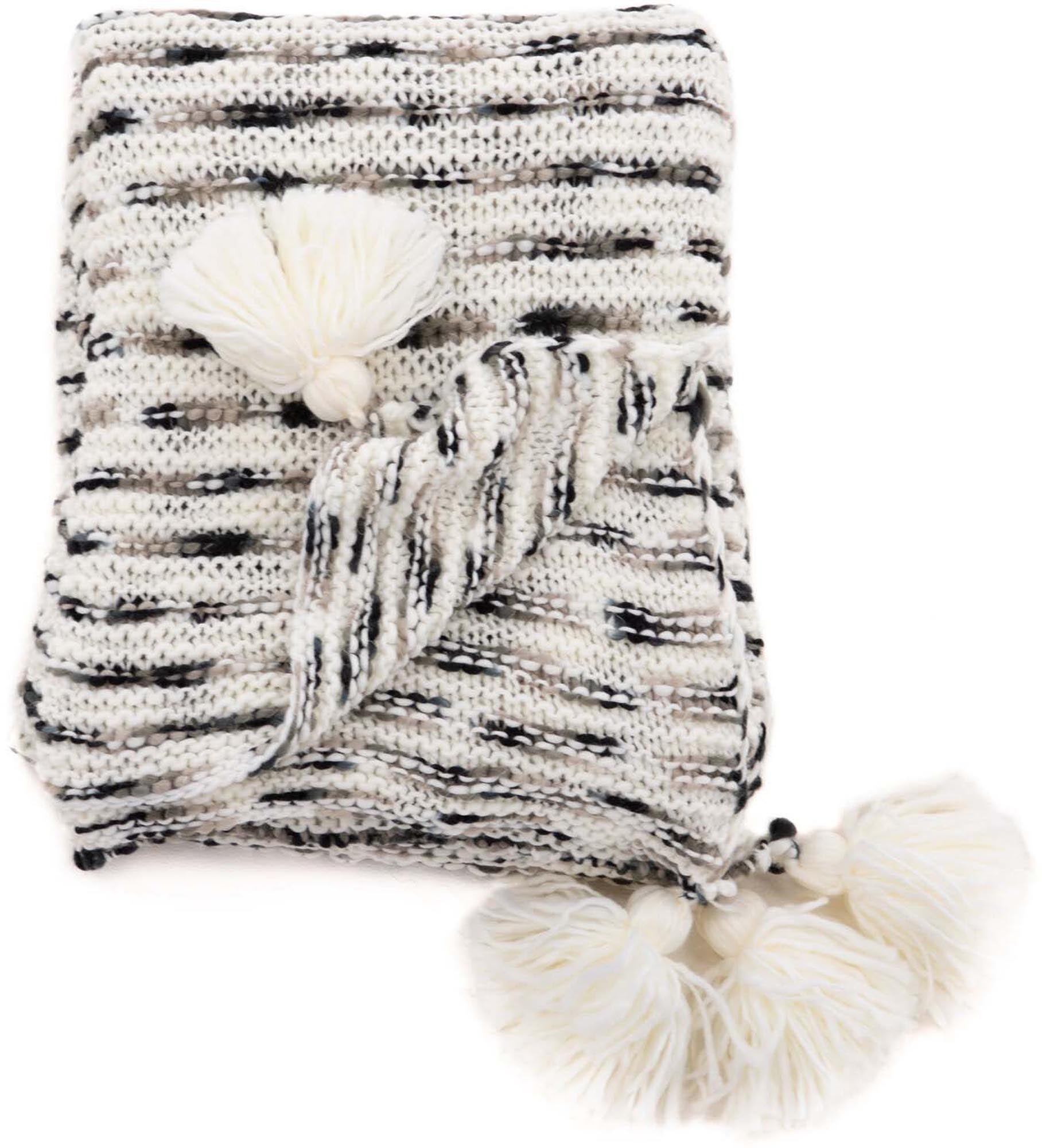 Unny Throw: Elegante Wärme und Komfort für Ihr Zuhause.