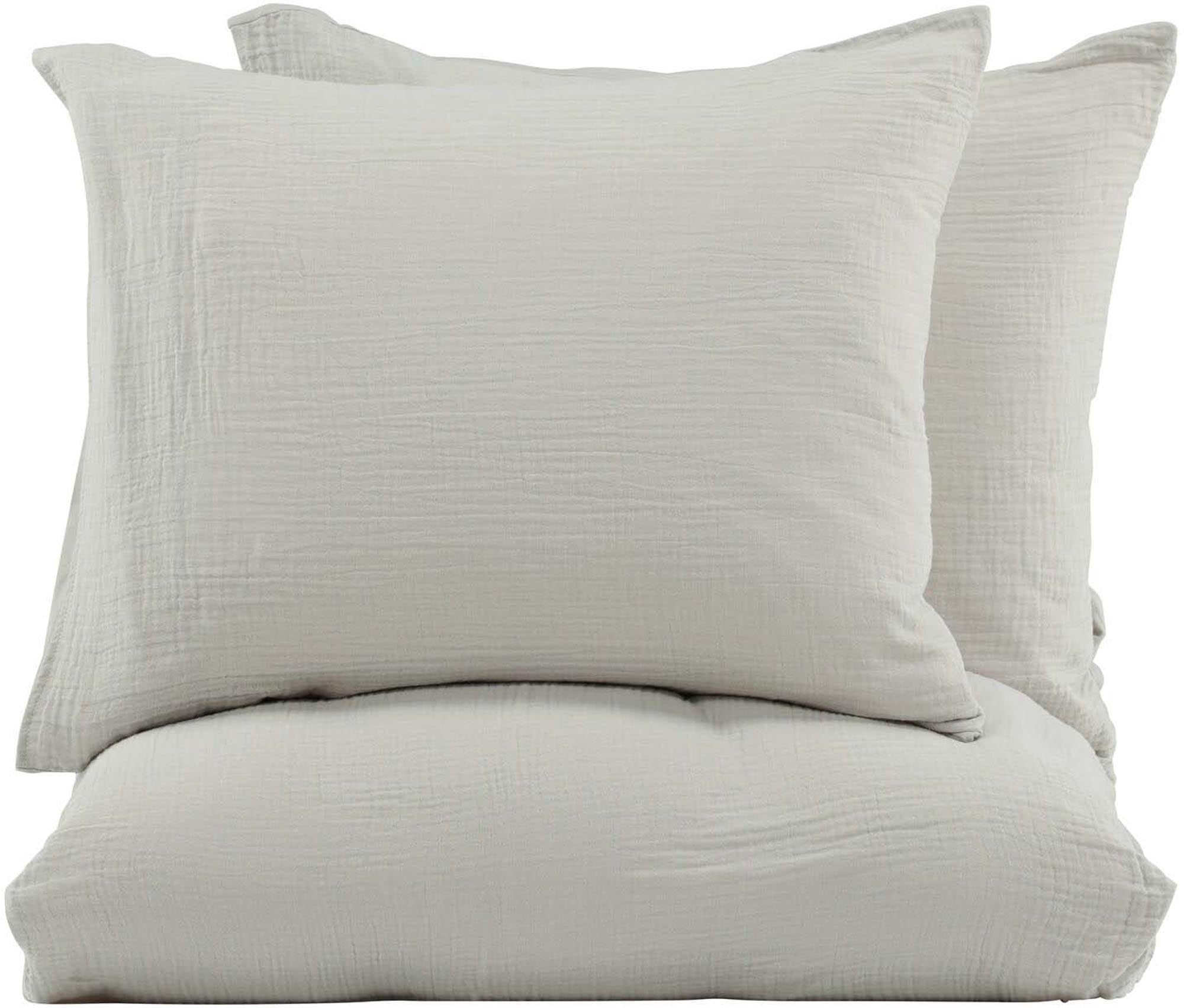 Entdecken Sie die Mila Bettgarnitur von Venture Home: Atmungsaktive, gekräuselte Baumwolle in sanften Erdfarben für stilvollen Komfort und entspannenden Schlaf.