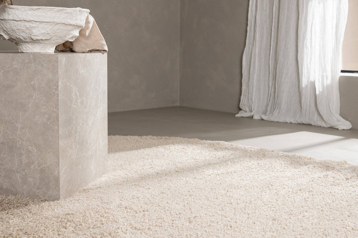 Walter Pluto Teppich Oval in Beige präsentiert im Onlineshop von KAQTU Design AG. Teppich ist von Venture Home