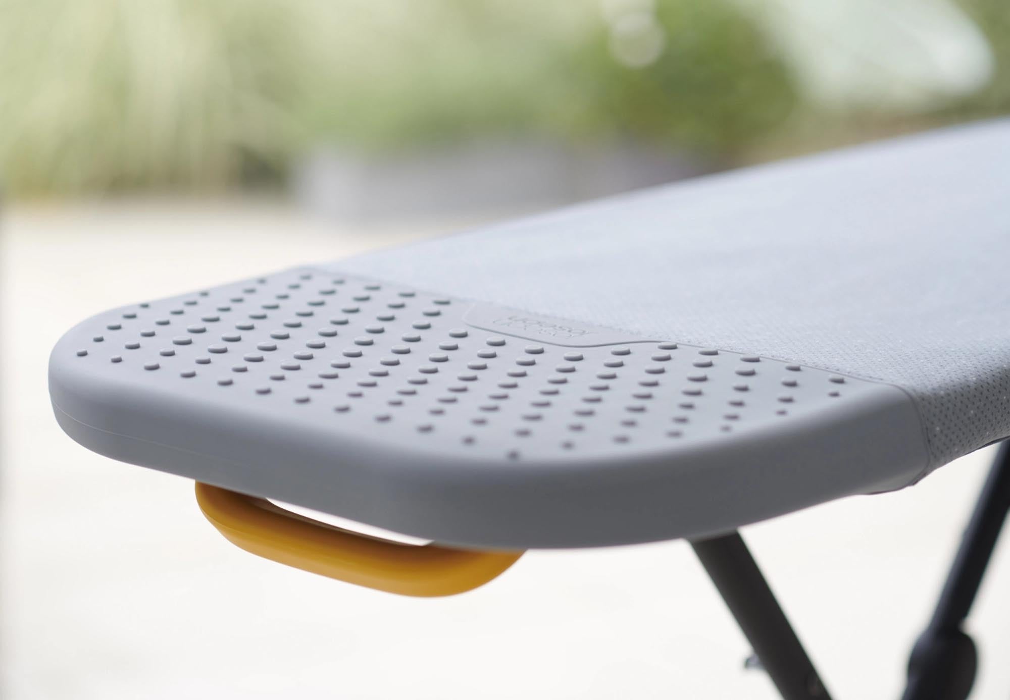 Stilvoller, langlebiger Bügelbrettbezug (130x38 cm) mit Silikonbeschichtung in modernem Grau-Gelb für effizientes Bügeln.