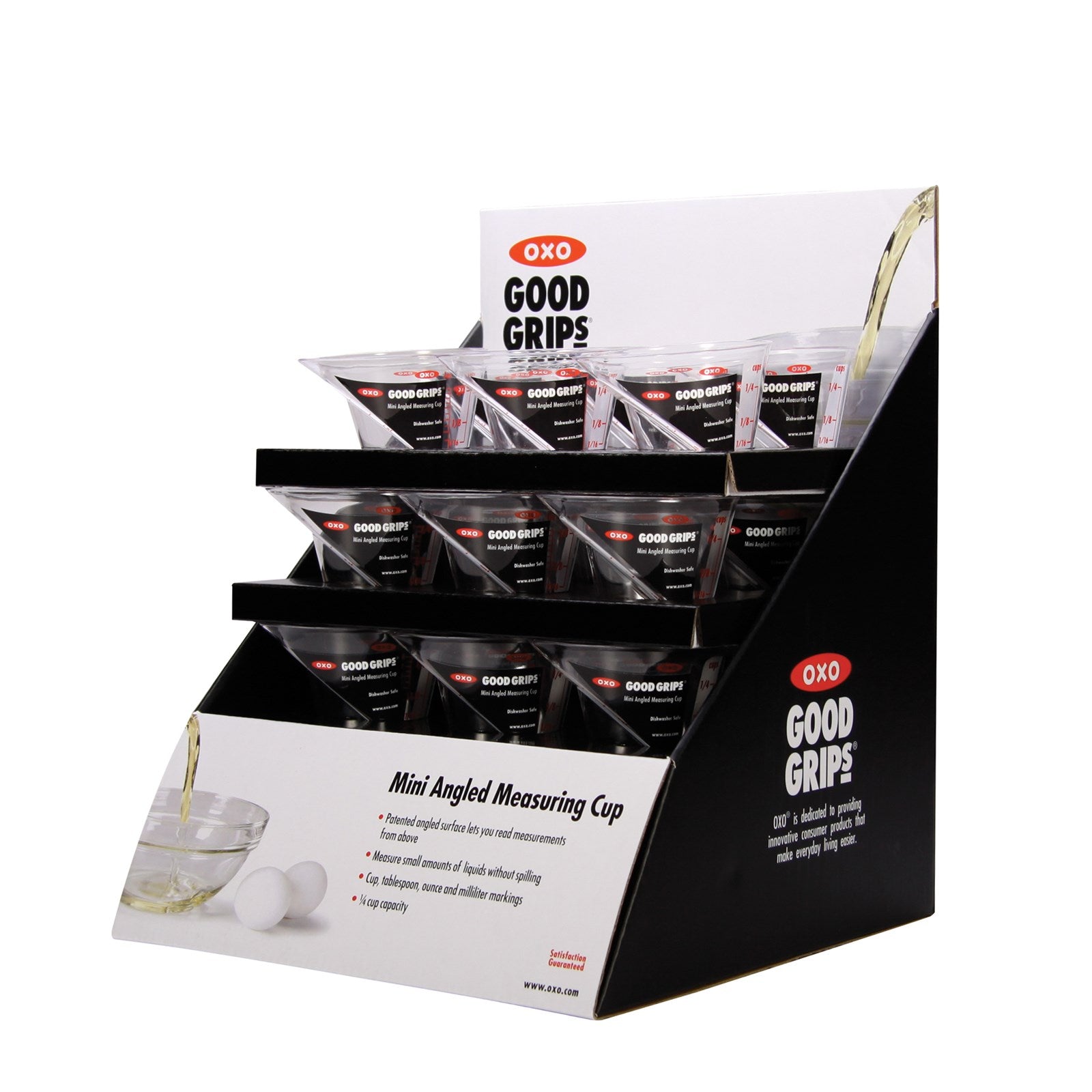 Kompakter 60 ml OXO Messbecher mit abgewinkeltem Ausguss für präzises Abmessen und Ausgiessen. Bruchsicher, spülmaschinenfest.