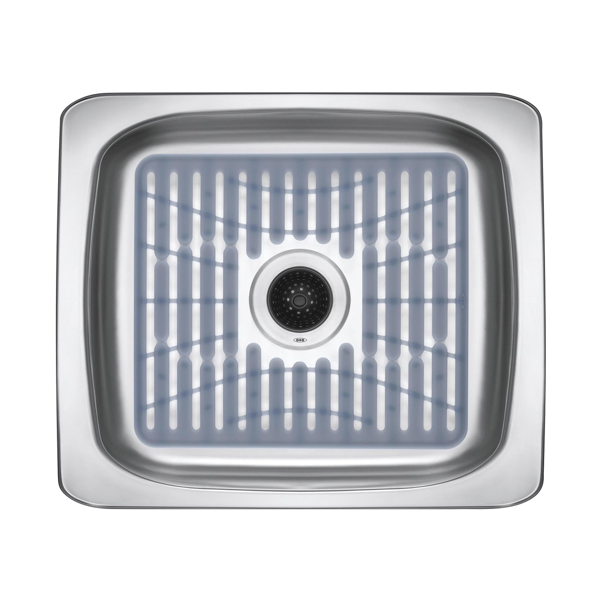 Schützen Sie Ihre Spüle stilvoll mit der grauen OXO Silikon Spülbeckenmatte (32x28 cm) – langlebig, rutschfest und pflegeleicht.