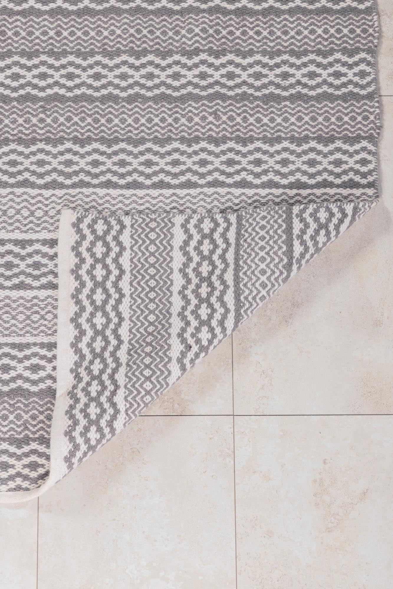 Sishu Teppich: Stilvoller Komfort aus hochwertiger Wolle für jeden Raum.