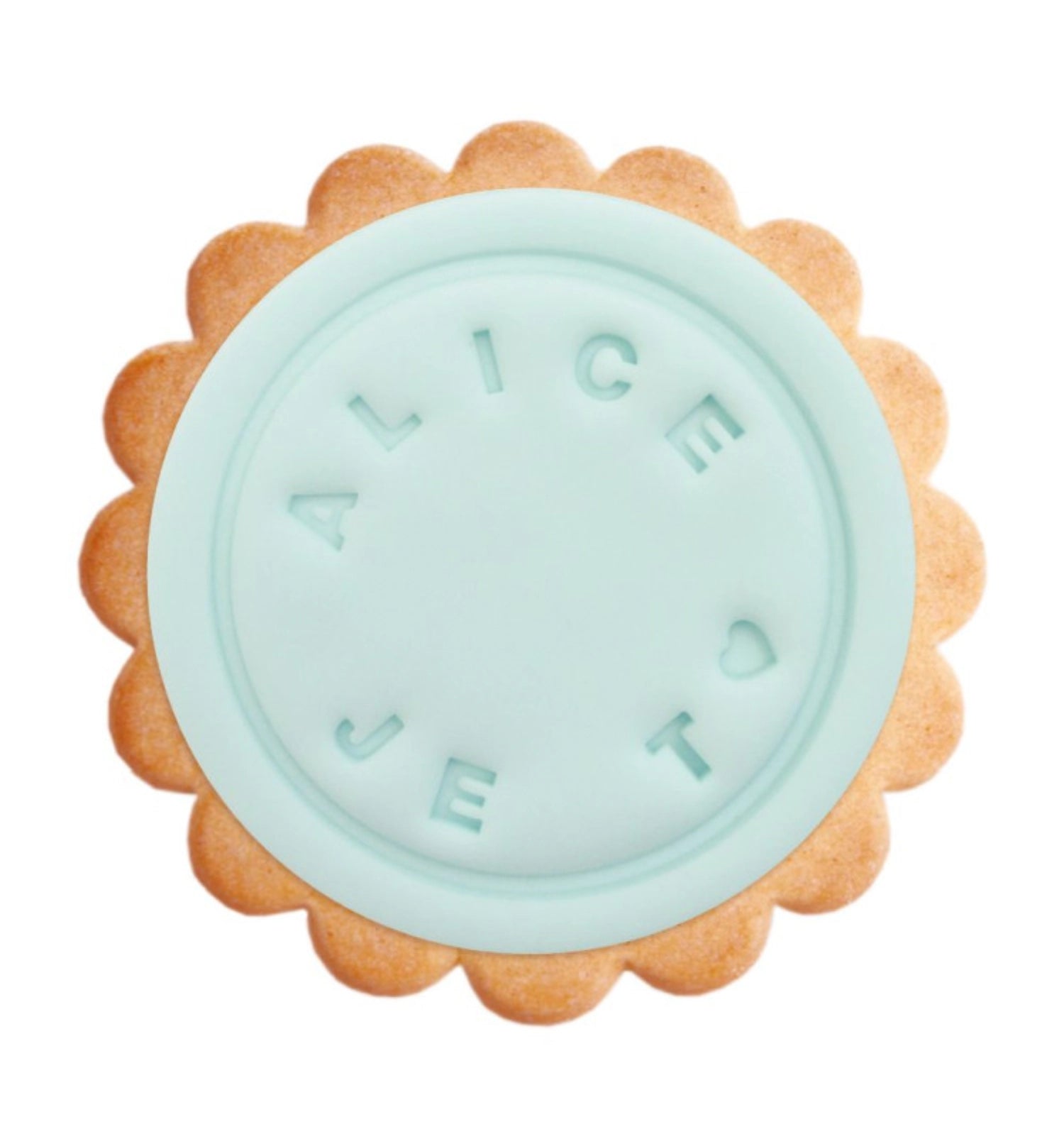 Detailaufnahme des Message Stempels von Scrap Cooking, ideal zum Verzieren von Backwaren mit individuellen Botschaften und Designs.