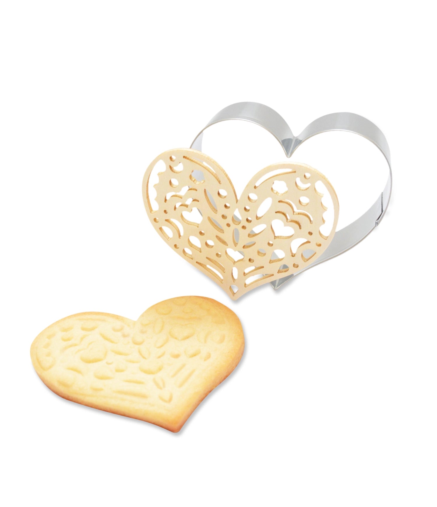 Charmante Ausstechform und Holzpräger in Herzform von Scrap Cooking, ideal zum Ausstechen und Verzieren von Keksen für romantische Anlässe.