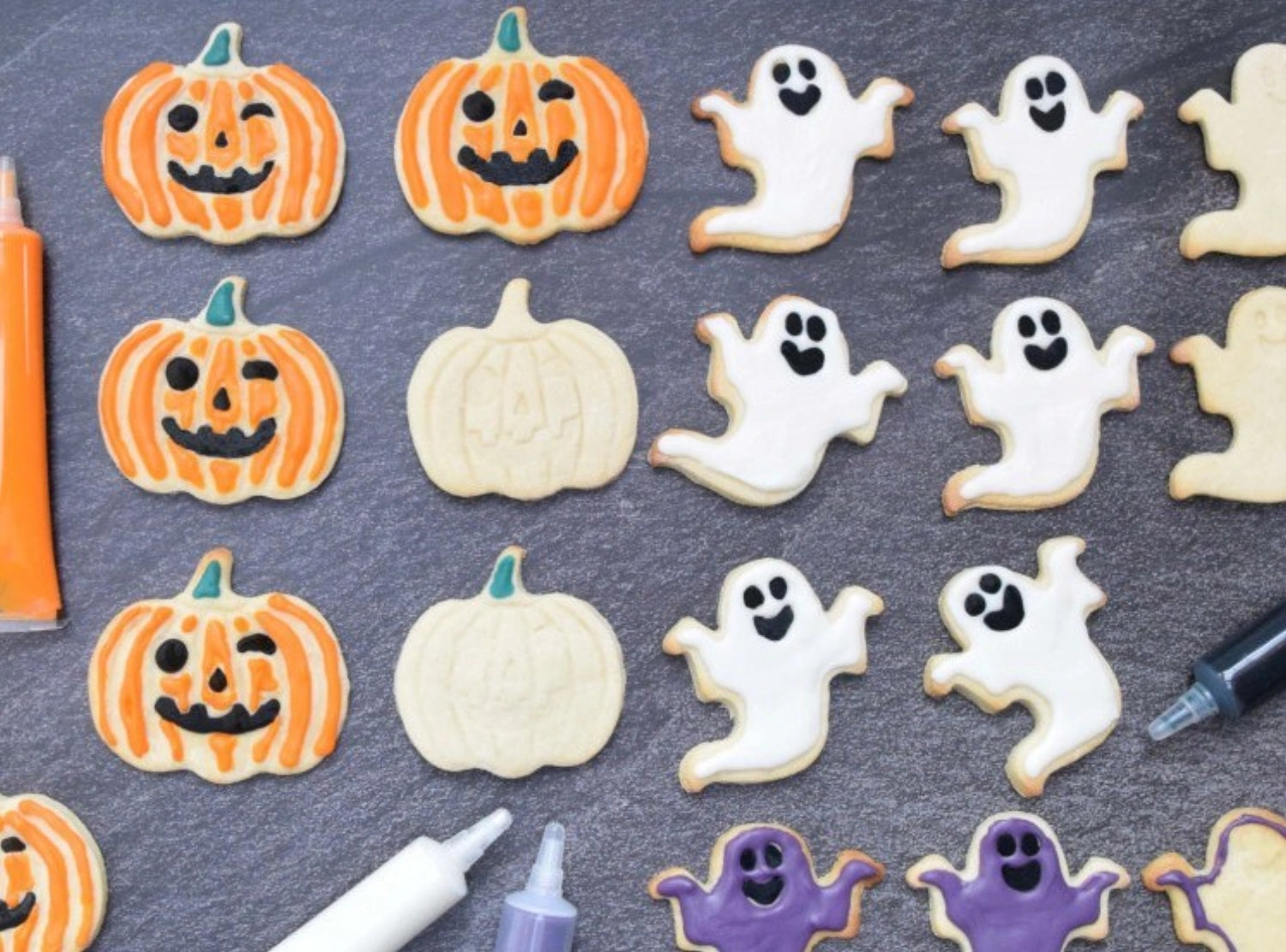 Vier farbenfrohe Schokostifte von Scrap Cooking, perfekt für Halloween-Dekorationen. Ideal zum Verzieren von Desserts und Snacks, 4x25g.