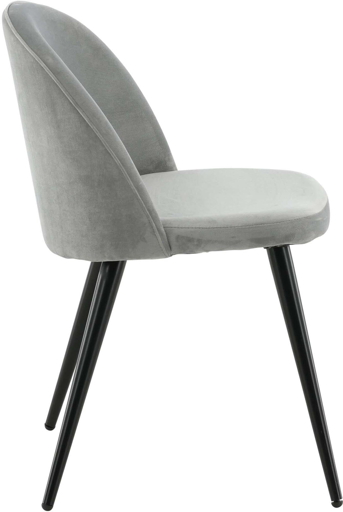 Erleben Sie den Velvet Stuhl von Venture Home – ein luxuriöser Samtstuhl, der Stil und Komfort in jeden Essbereich bringt.