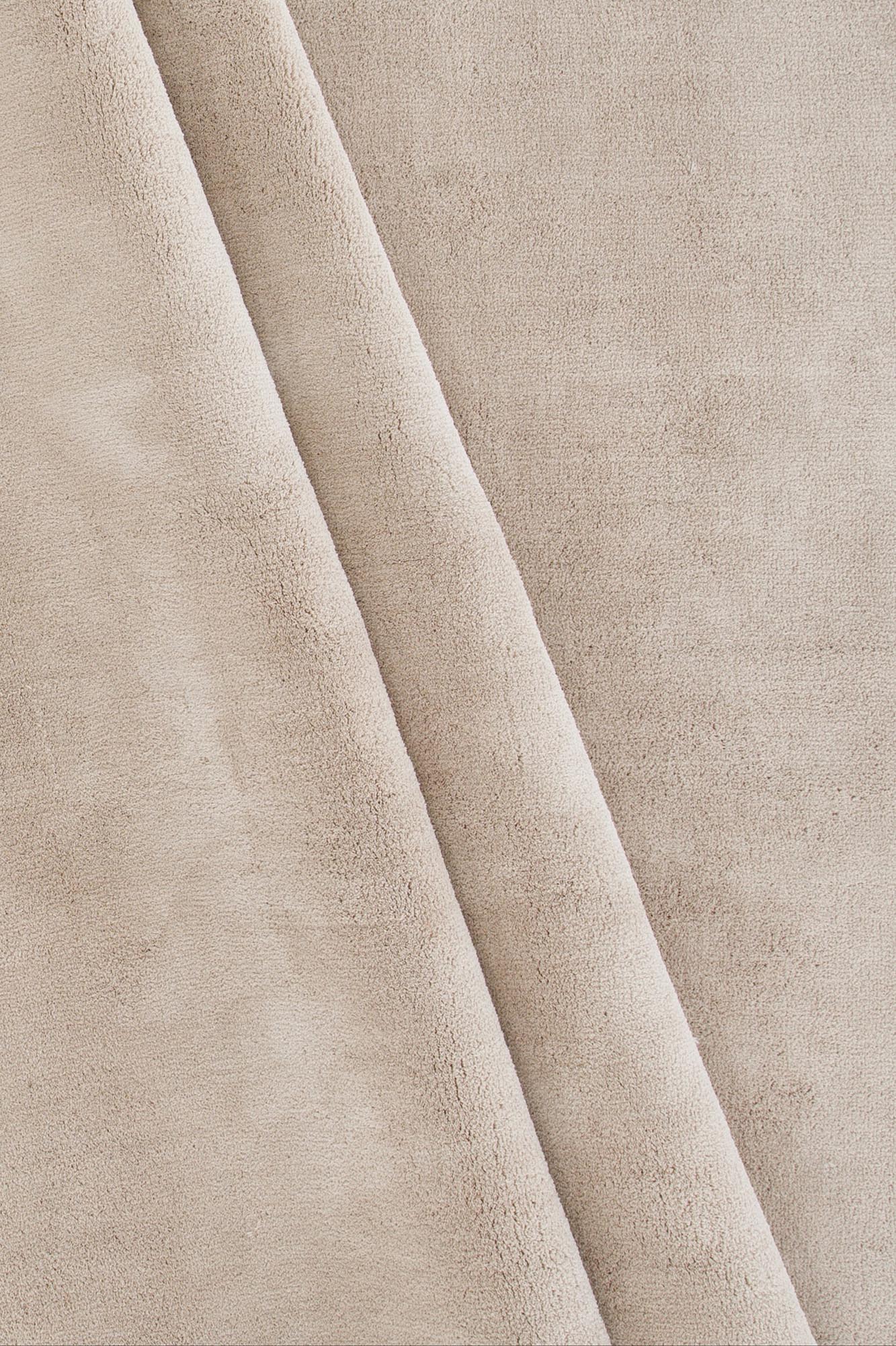 Wunderteppich in Beige präsentiert im Onlineshop von KAQTU Design AG. Teppich ist von Venture Home