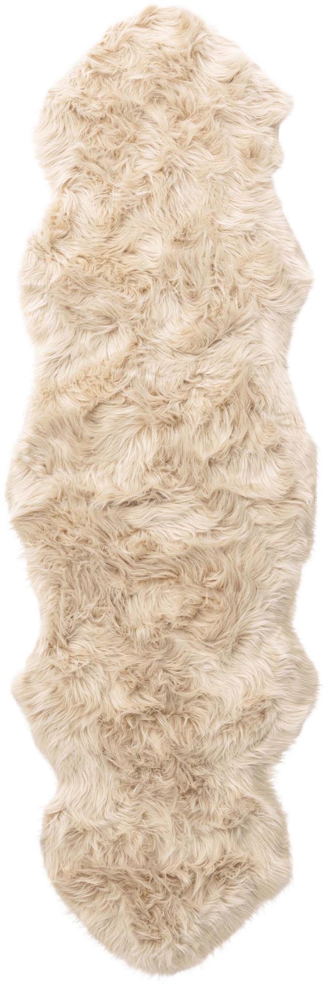 Die Katy Decke von Venture Home: Weich, langlebig, beige. Perfekt als Überwurf oder Flurläufer. Stilvoll und pflegeleicht.