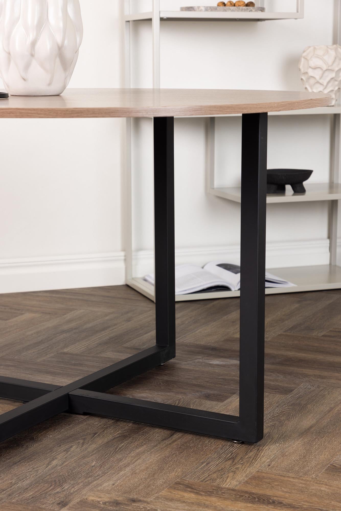 Der Durango Tisch von Venture Home vereint stilvolles Design mit Funktionalität. Hochwertige Materialien und modernes Stahlgestell schaffen eine einladende Atmosphäre.