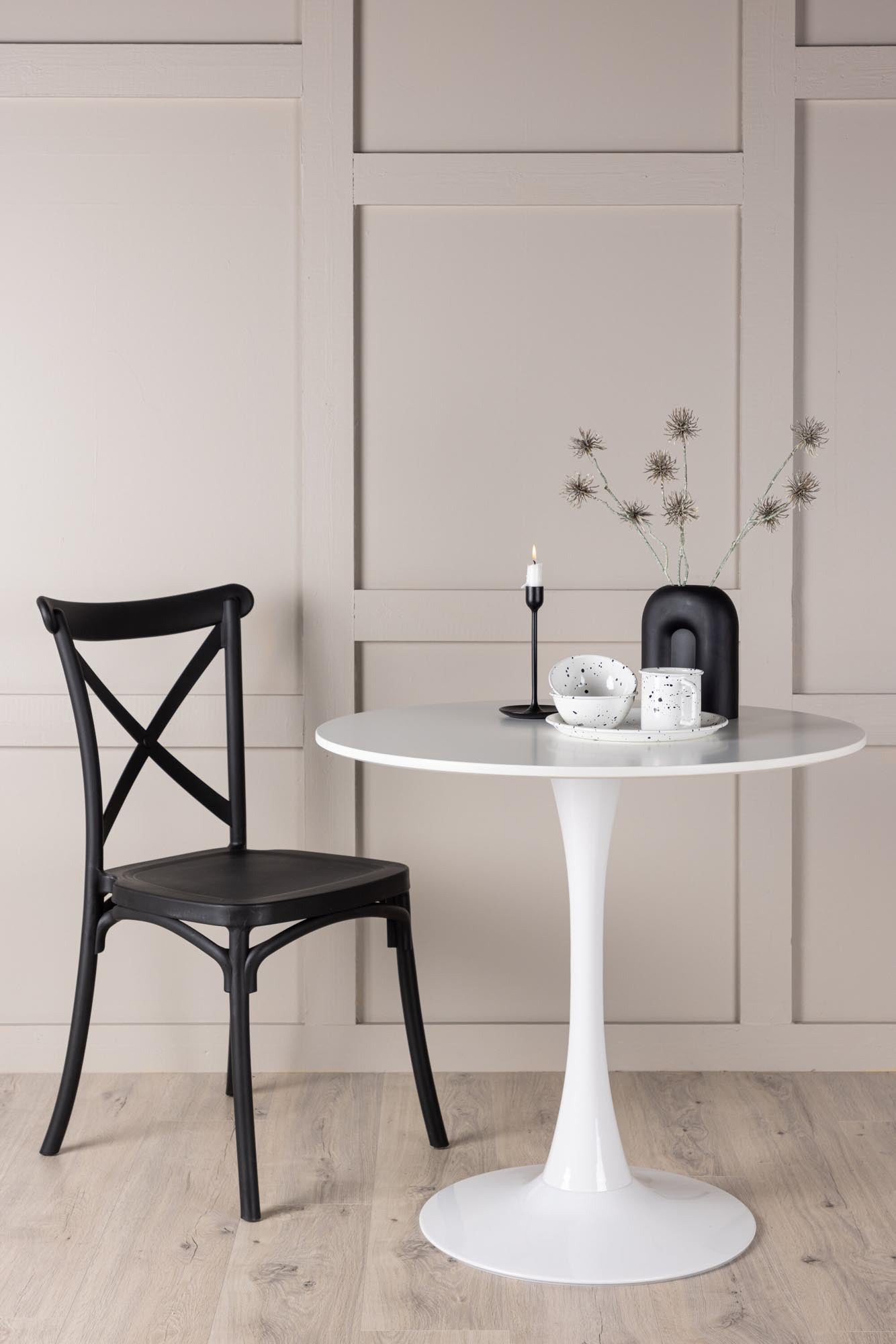 Moderner Esstisch mit runder, hellgrauer MDF-Platte und weissem Stahlgestell. Ideal für stilvolle, nordische Einrichtung.