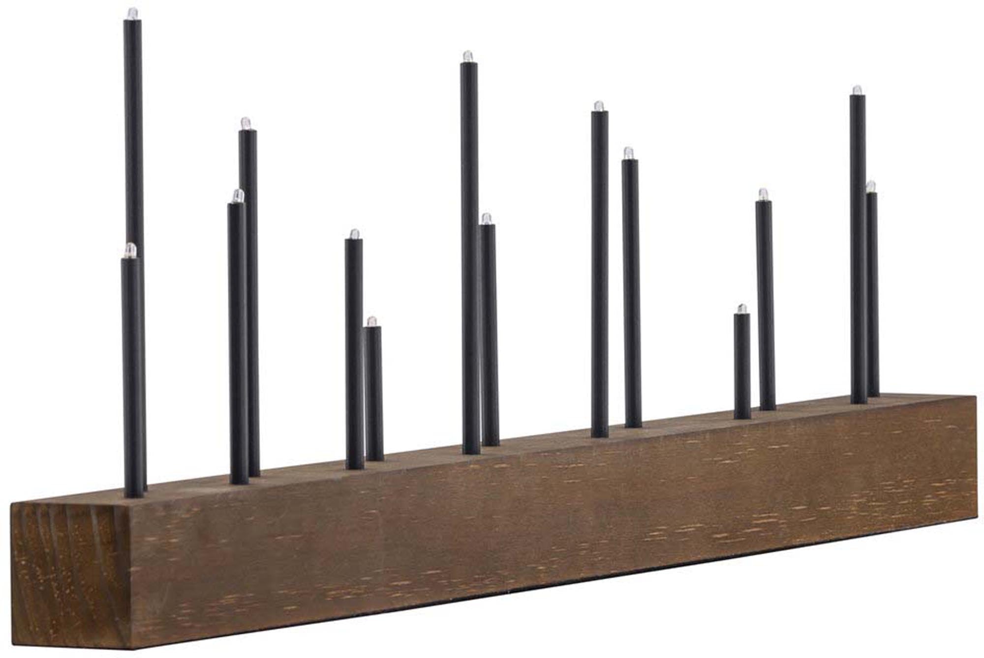 Entdecken Sie die Kungsberget Tischlampe von Venture Home – ein elegantes Lichtobjekt, das mit seinem warmen Licht und modernen Design jede Weihnachtsfeier bereichert.