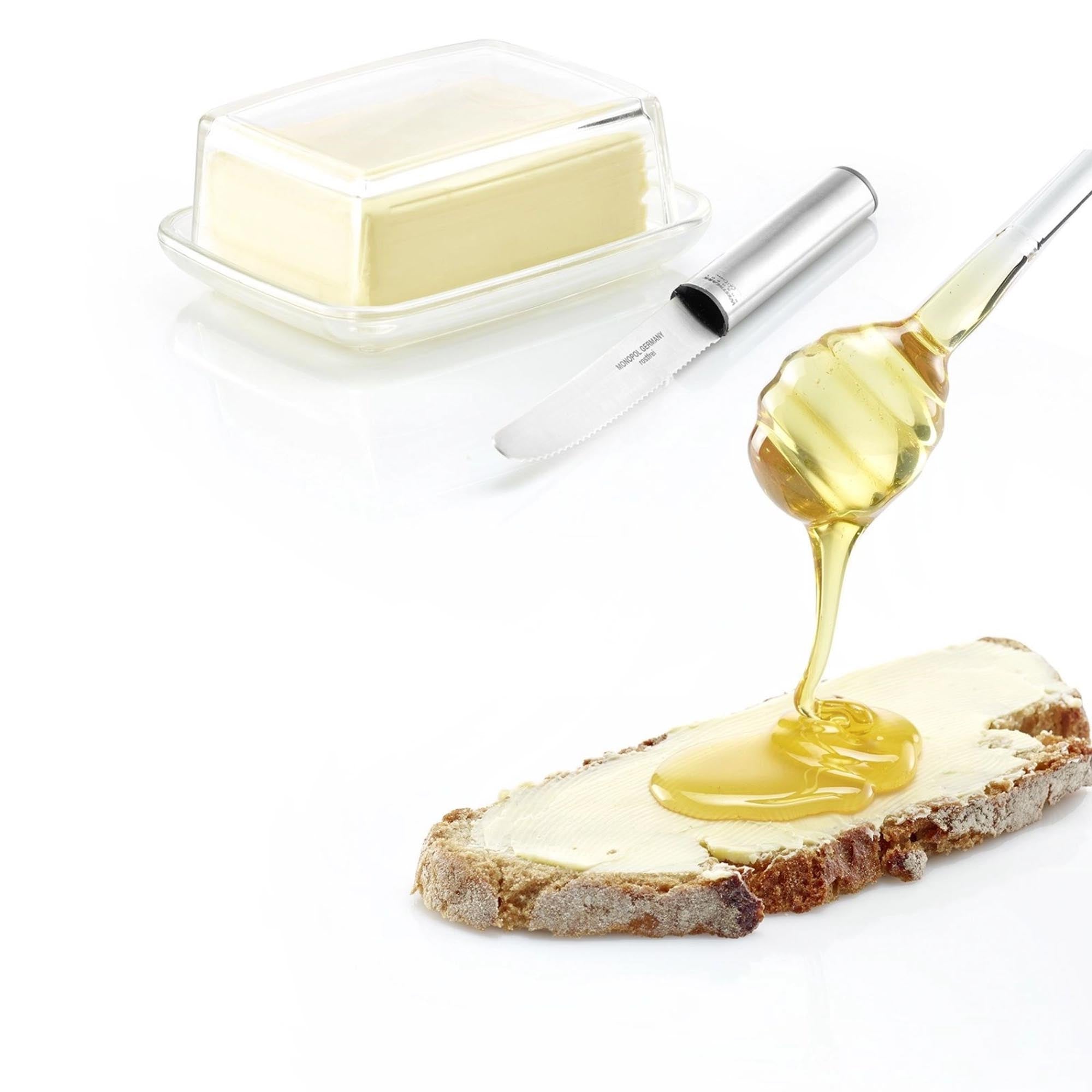 Eleganter Honigtopf Melli von Westmark, ideal für die Aufbewahrung von Honig, mit praktischem Deckel und Löffel für den Frühstückstisch.