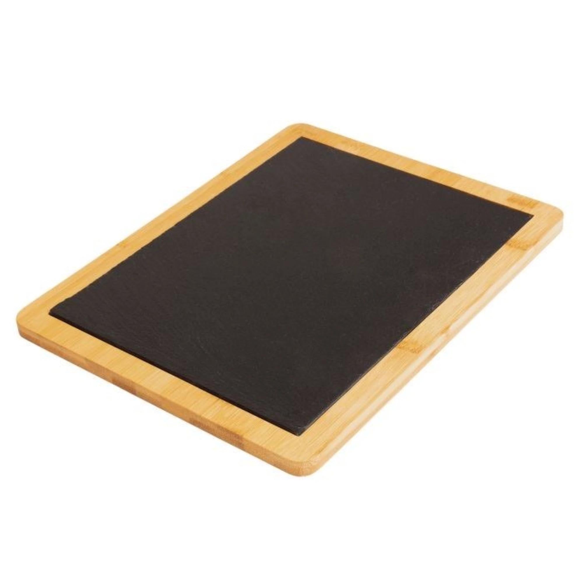 Entdecken Sie die elegante Servierplatte "Tapas u. Friends" von Westmark aus Bambus und Schiefer (32x25 cm) – ideal für Tapas, Snacks und stilvolle Präsentationen.