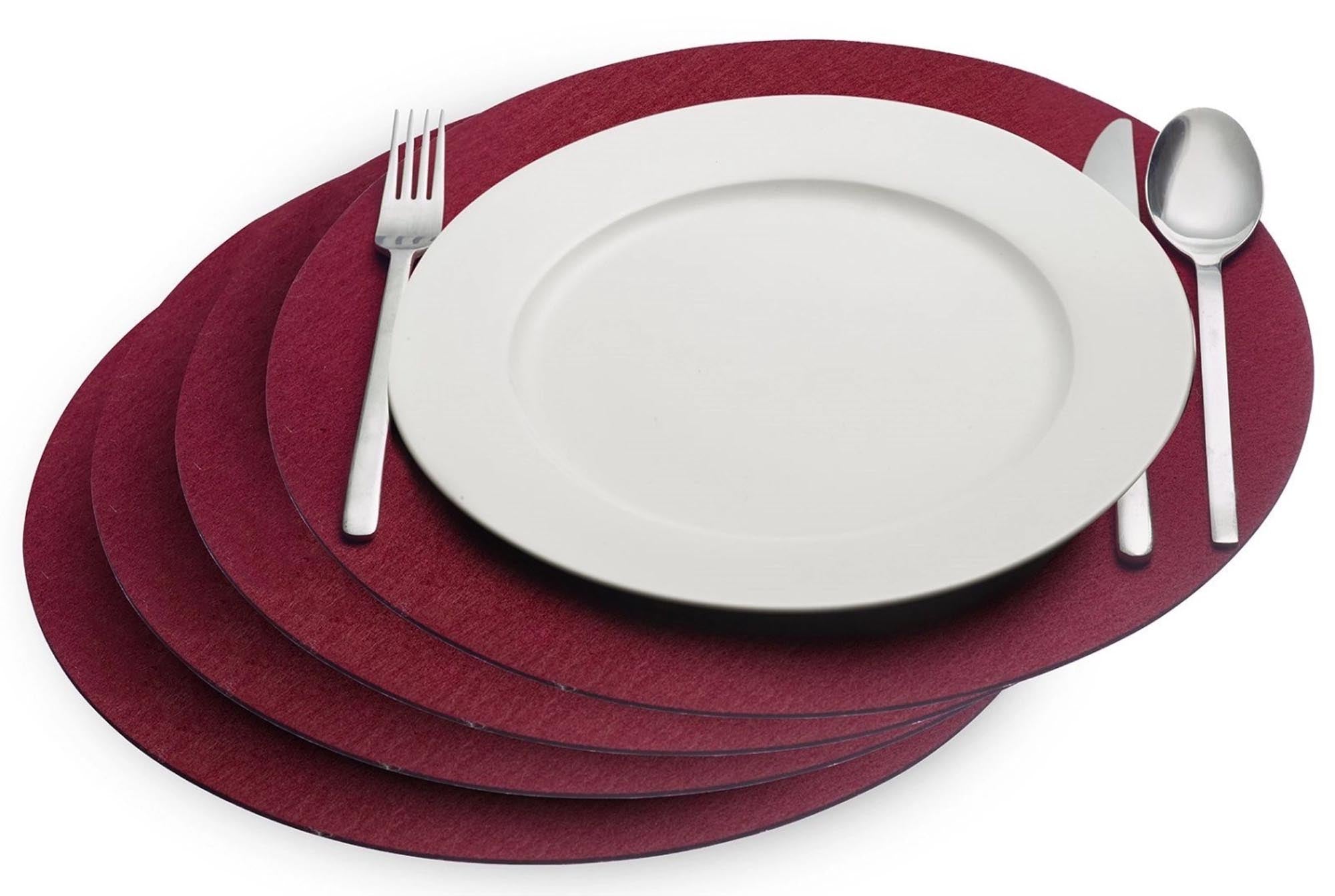 Entdecken Sie das 4er Set Tischsets Cozy von Westmark. Runde, rote Tischsets (D35cm) für jeden Anlass, pflegeleicht, langlebig und elegant.