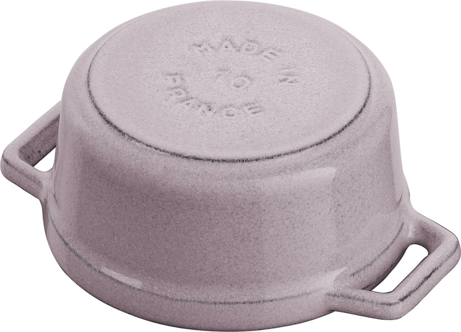 Kleine runde Cocotte (0.25l) von Staub, perfekt für individuelle Portionen und ansprechende Tischdekoration.