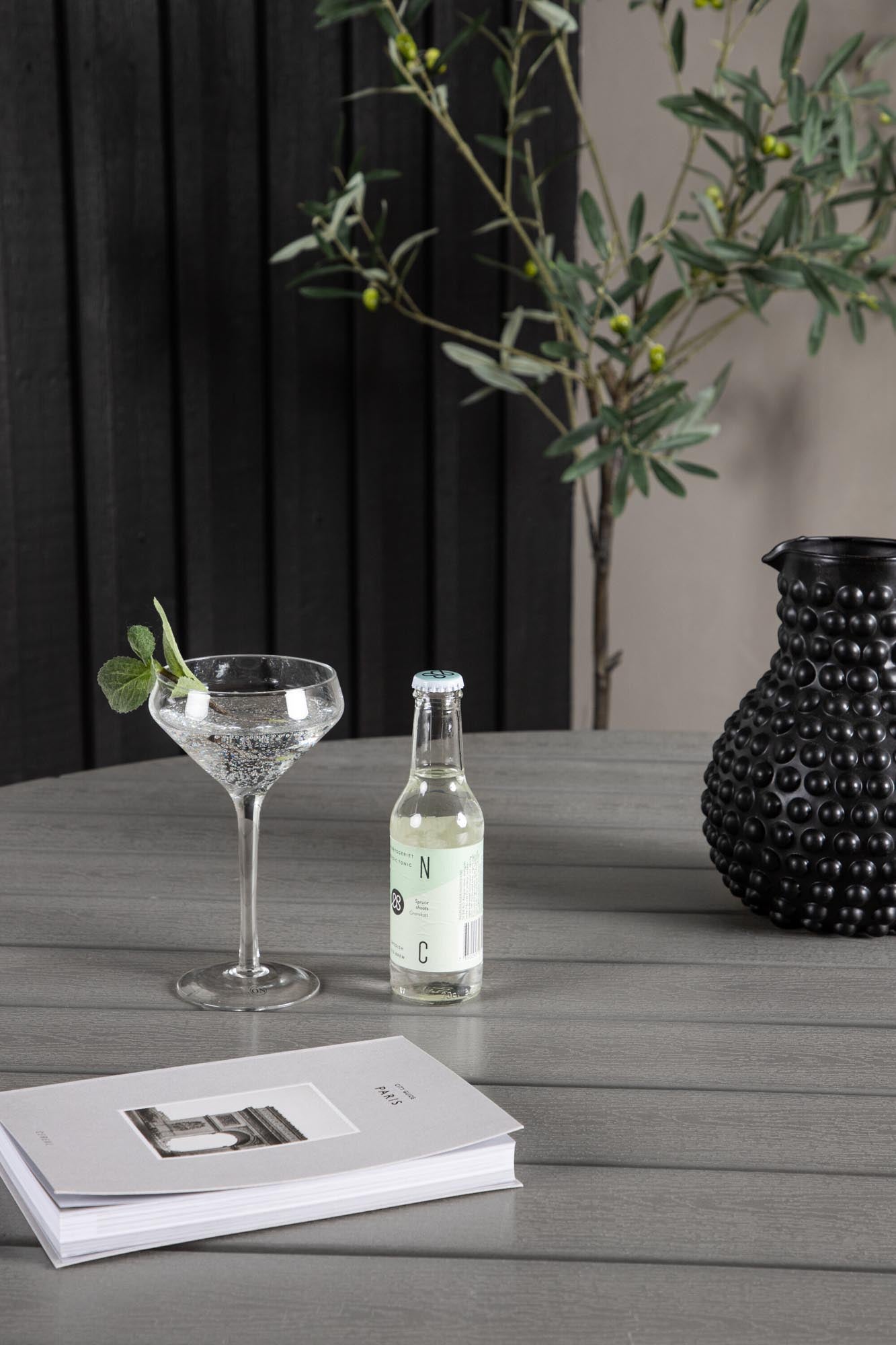 Runder Gartentisch von Venture Home, ideal für Garten oder Terrasse, wetterfest, robust und mit modernem Design.