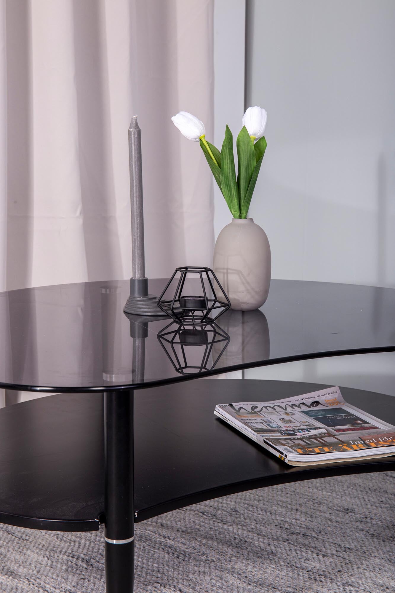 Stilvoller Egg Tisch von Venture Home mit edler Glasplatte.