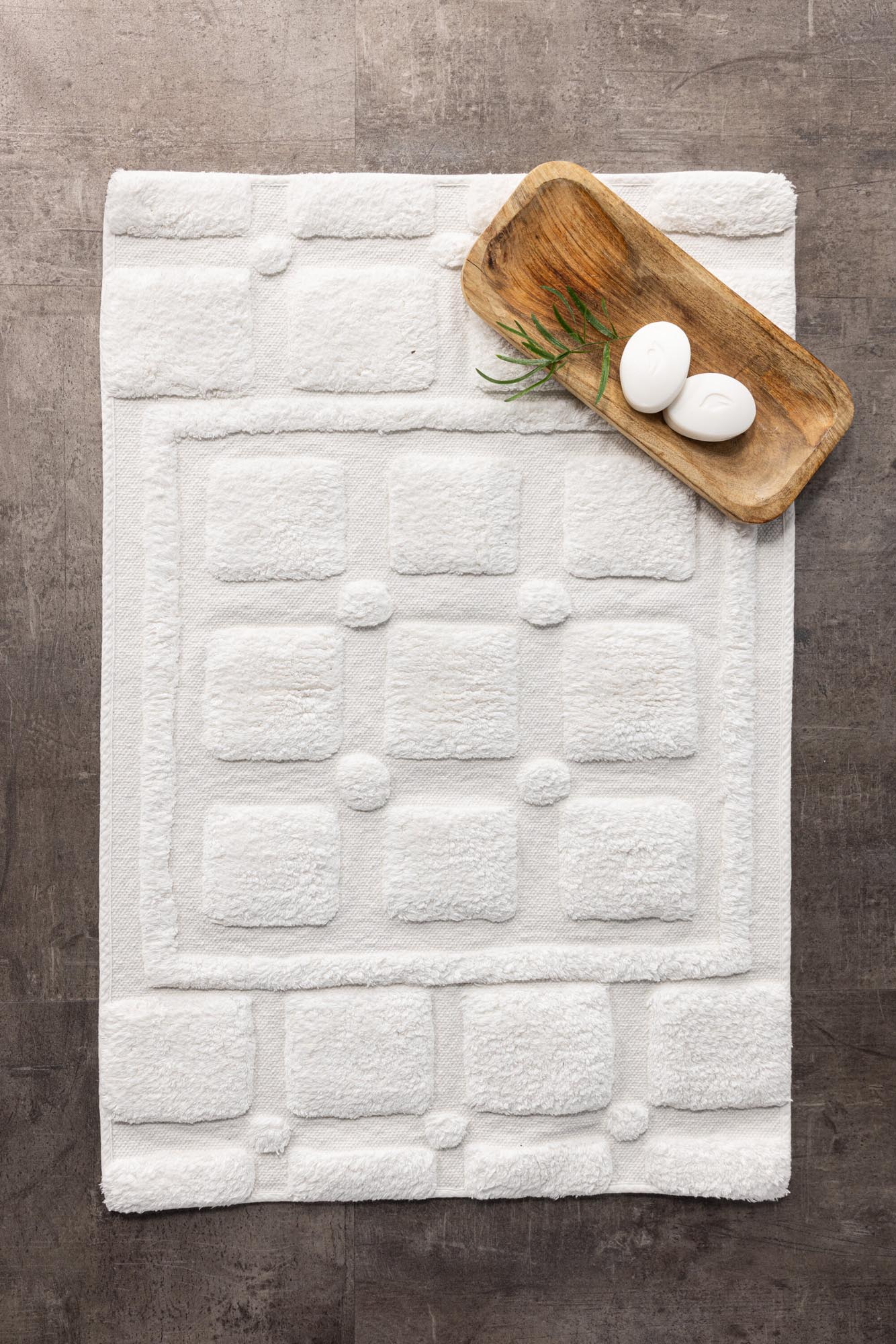 Stilvolle Putte Teppichmatte von Venture Home, 60x90 cm, aus hochwertiger Baumwolle. Pflegeleicht, modern und perfekt für Ihr Badezimmer.