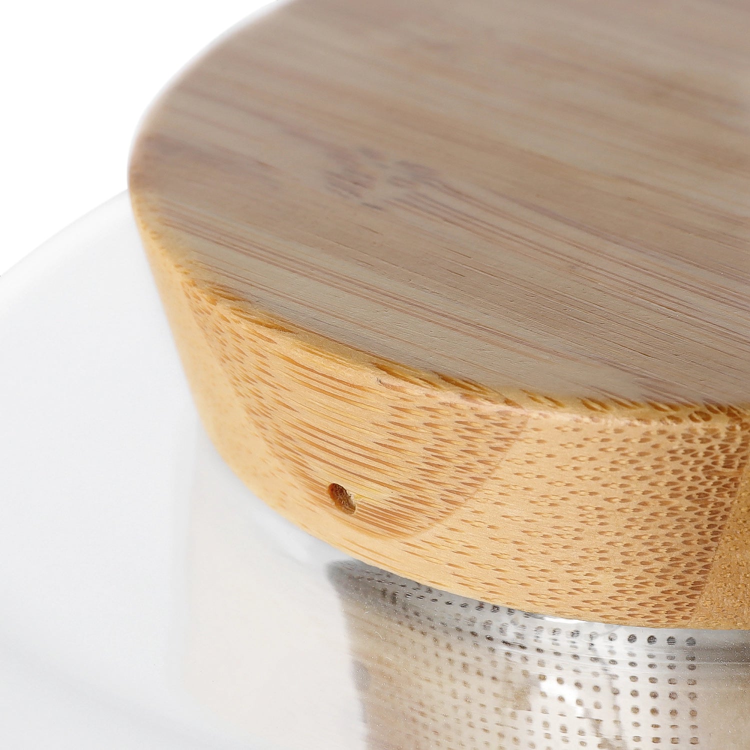 Moderner Teekrug aus hitzebeständigem Borosilikatglas, ausgestattet mit einem ansprechenden Holzdeckel, perfekt für Teeliebhaber.