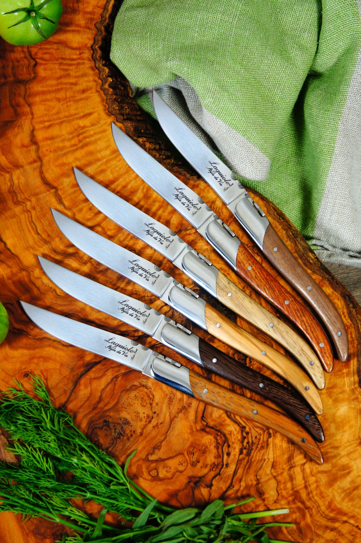 Laguiole Luxury Line Steakmesser Verschiedene Holzarten in Mehrfarbig präsentiert im Onlineshop von KAQTU Design AG. Küchenmesser ist von Laguiole Style de Vie