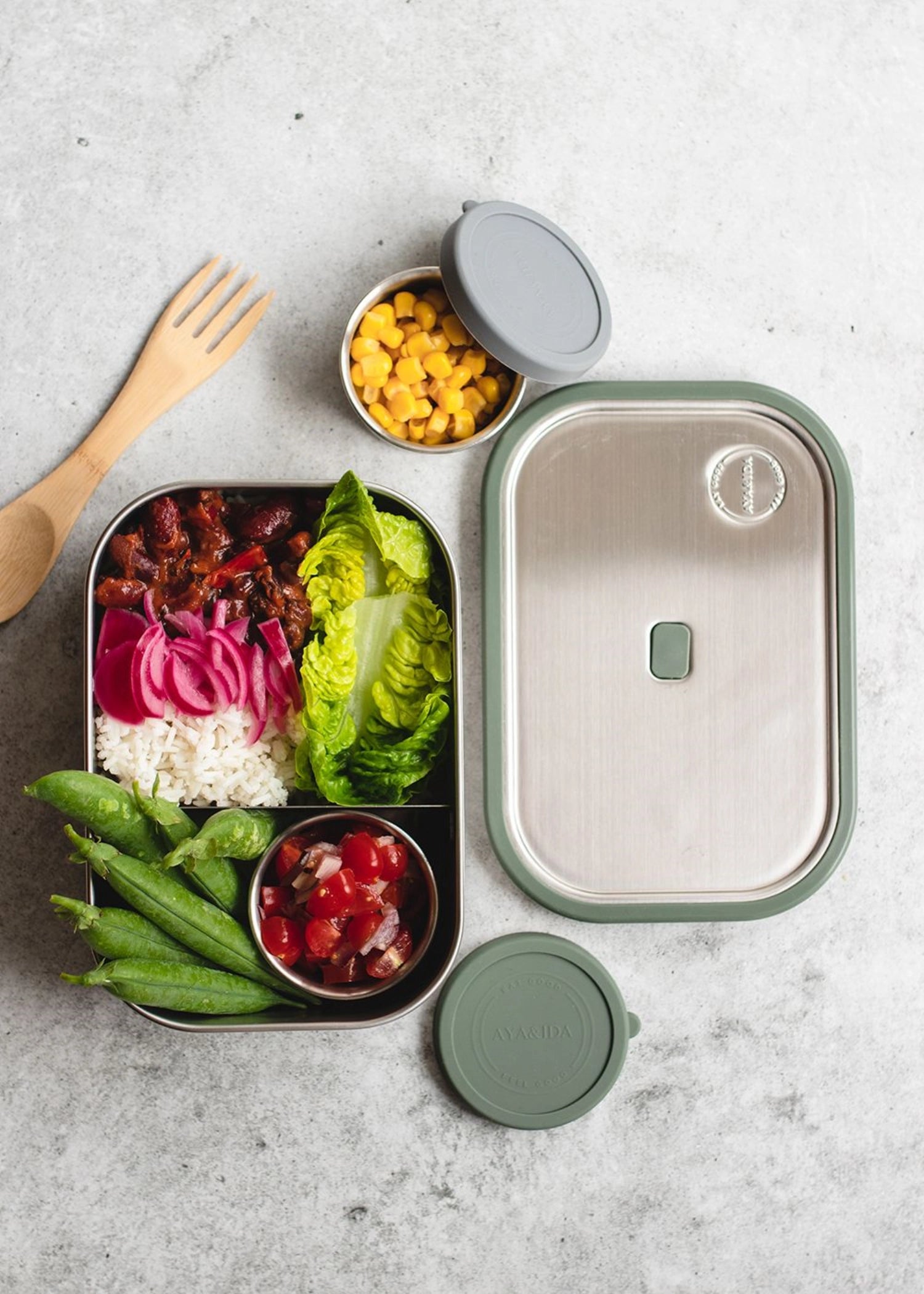 Stylische Lunchbox in tropischem Grün mit 1000ml Volumen, ideal für unterwegs. Perfekt für gesunde Snacks und Mahlzeiten.
